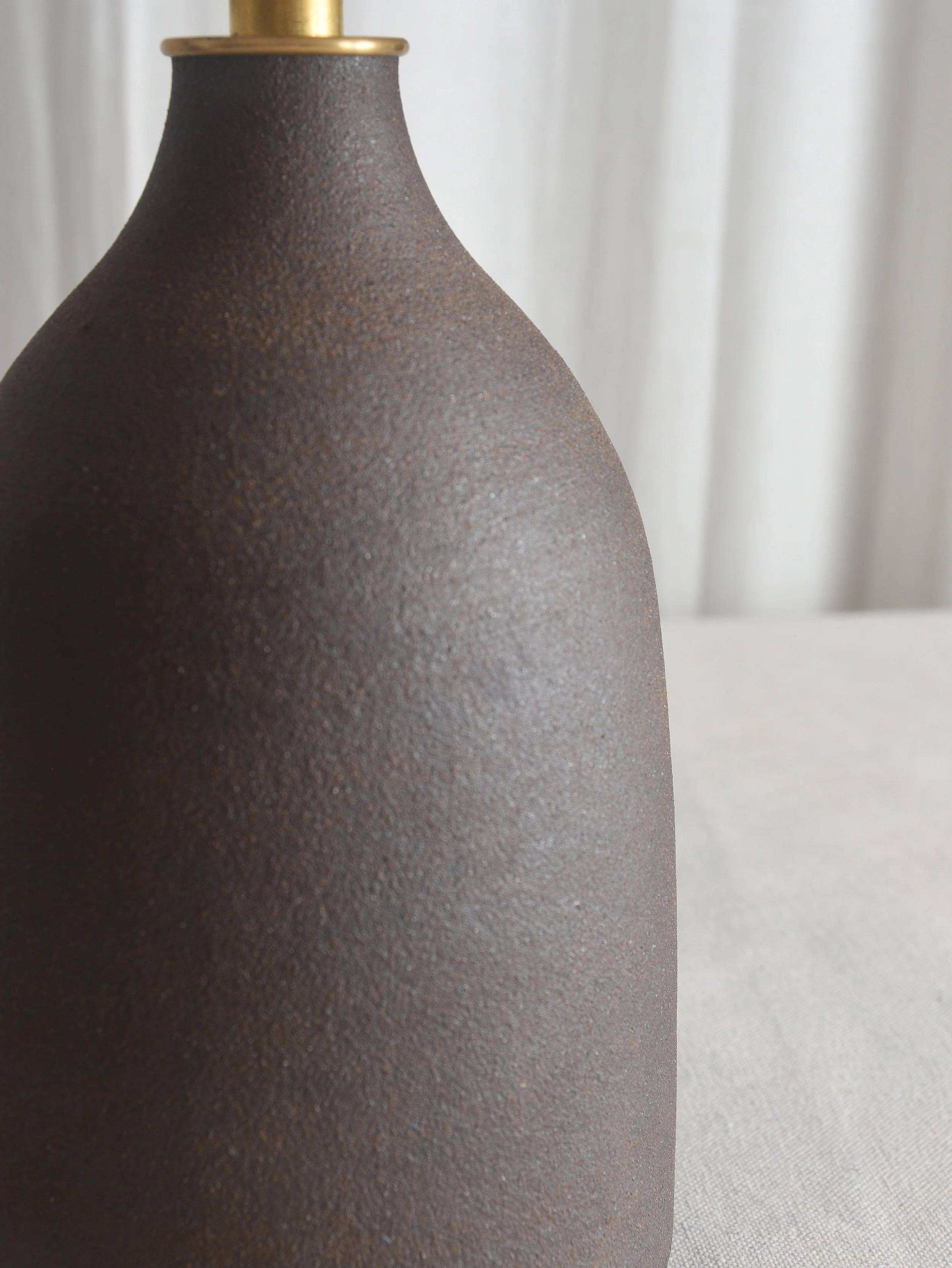 brwon raw clay bottle detail.jpg