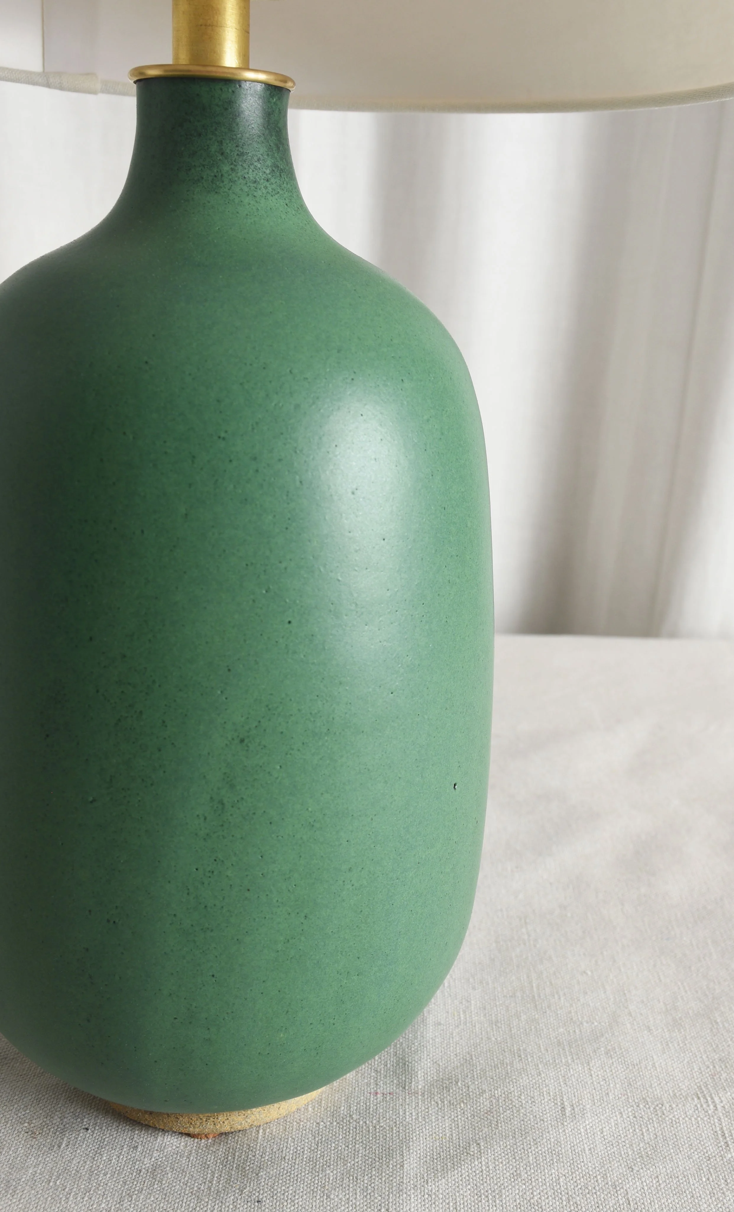 satin green rounded bottle lamp deet.jpg