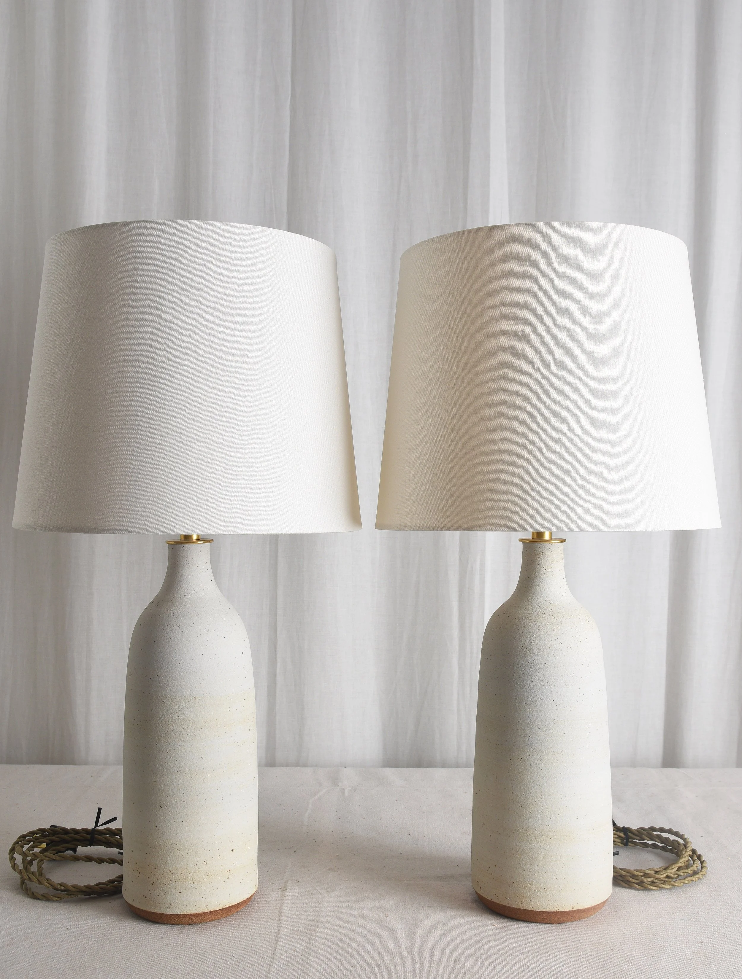 TALL MATTE SAND WHITE BOTTLE LAMPS