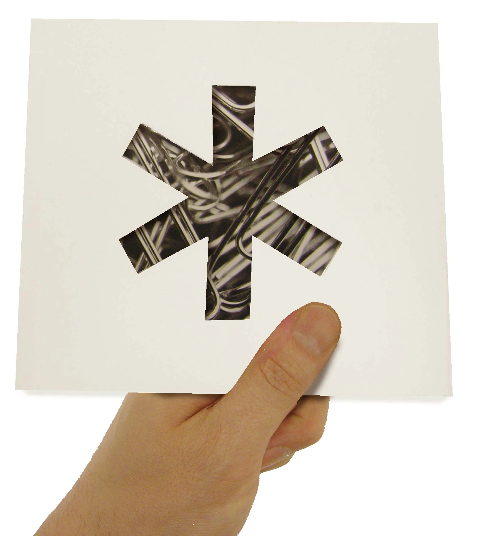 Front cover with die-cut "snowflake asterisk"