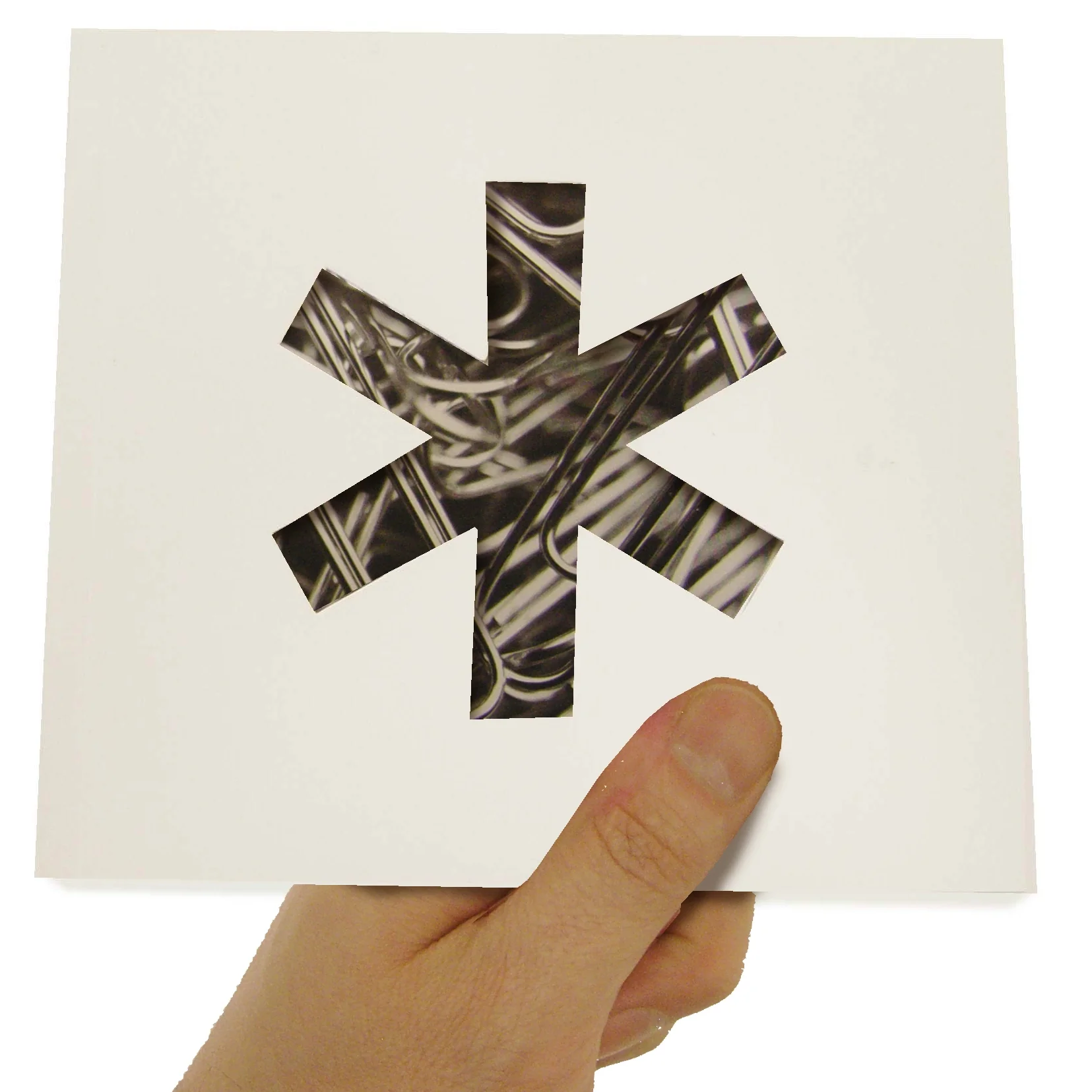 Front cover with die-cut showing thr