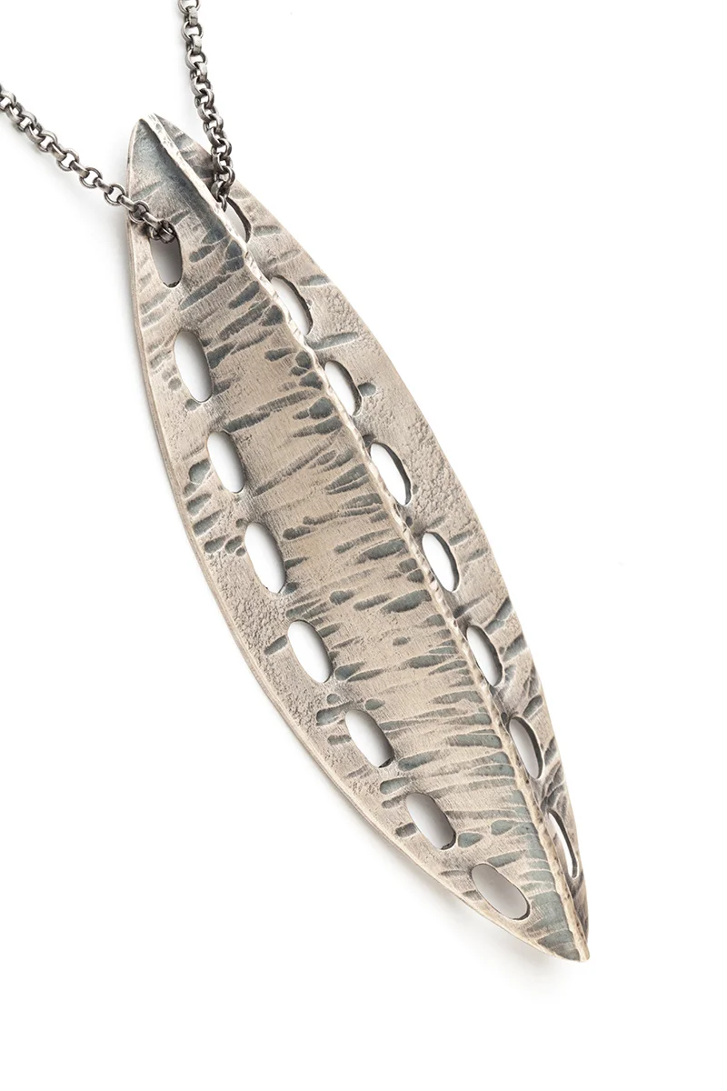 Perforated Shield Pendant