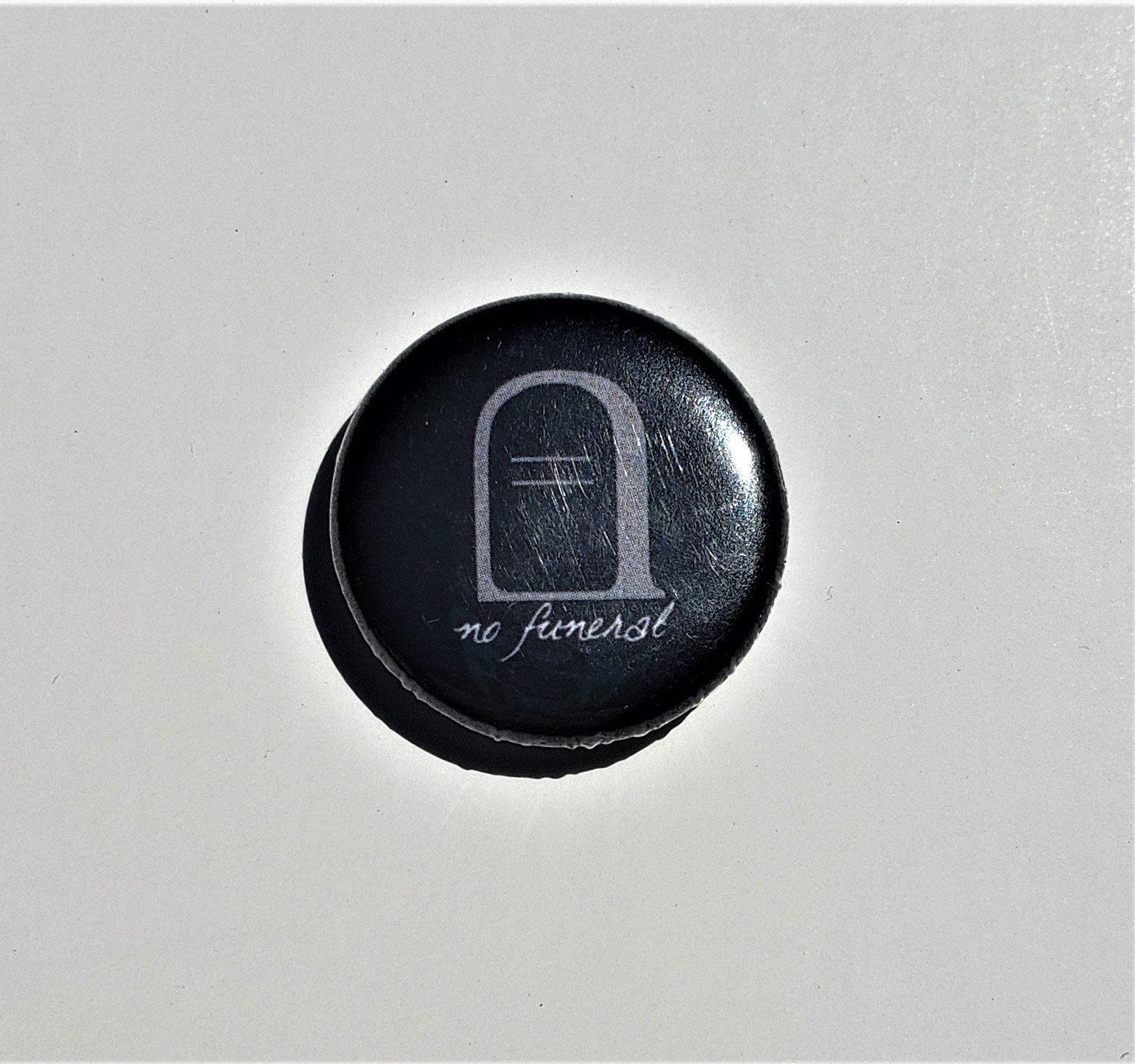 no funeral pin.jpg
