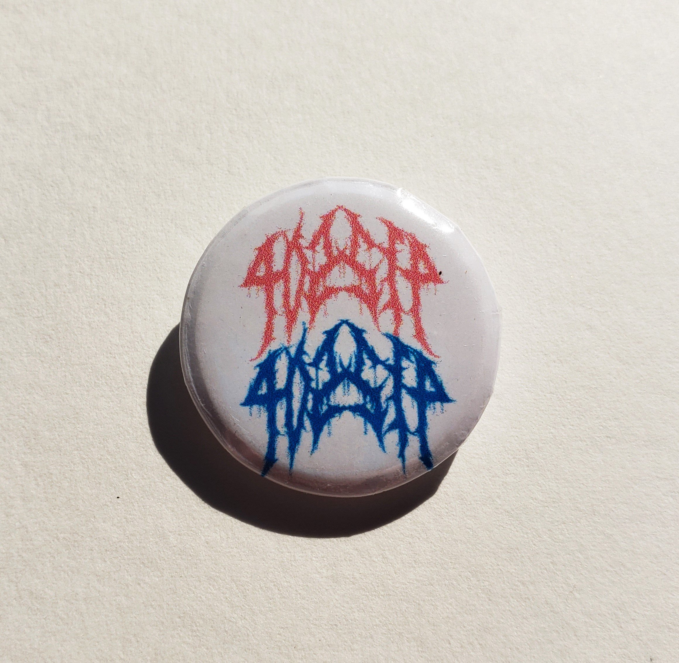 gossip pin white.jpg