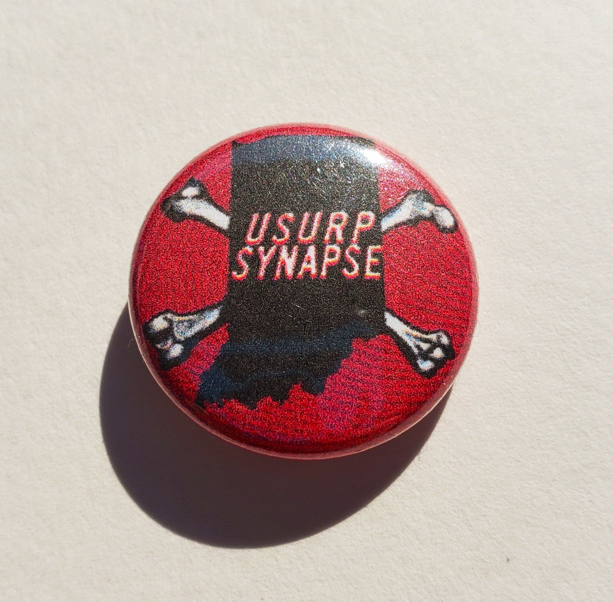 usurp pin red.jpg