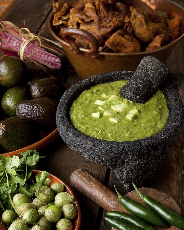 Guacamole in a molcajete, Mexican food photography