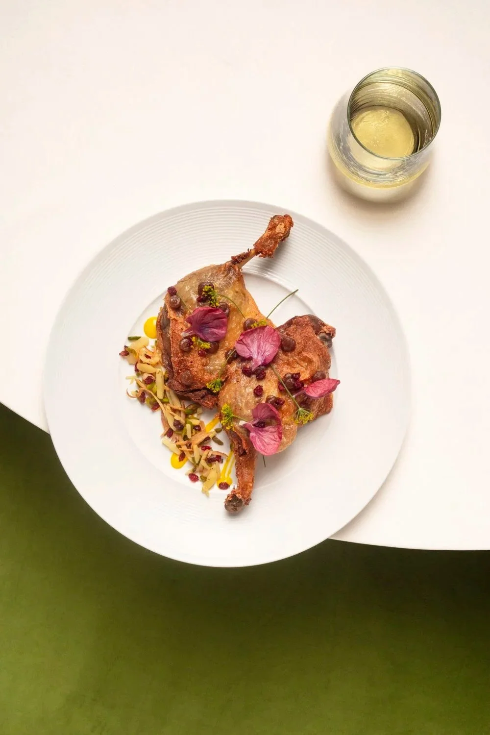 Chicken dish with flowers and white wine at Perse restaurant, Los Angeles restaurant food photography