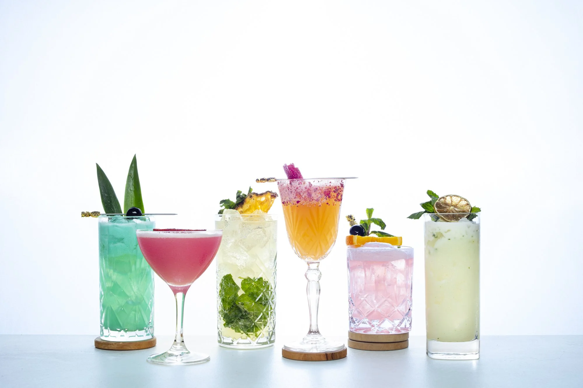 colorful-craft-cocktail-lineup-white-background.jpg