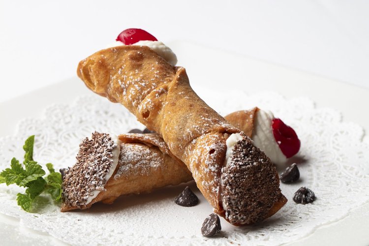Cannoli with ricotta cream and raspberries - soft light food photography