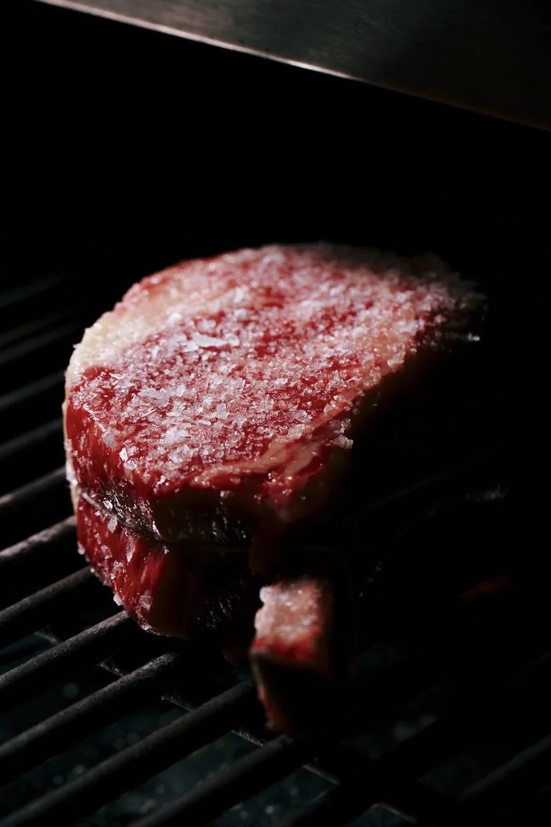 Raw steak on the grill - Palm Springs restaurant photography 