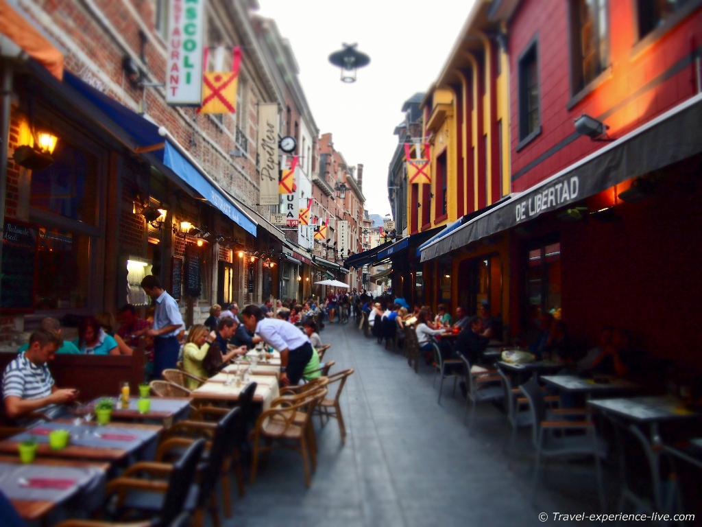 Munstraat in Leuven is a popular street among university students and tourists, because of its many restaurants, pubs, and bars.