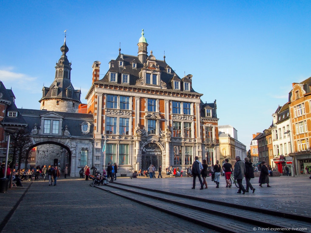 The Belfry of Namur stands in a corner of a popular square.