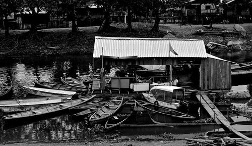 A dock in Leticia, Colombia just off the Amazon river by Jake Caplener