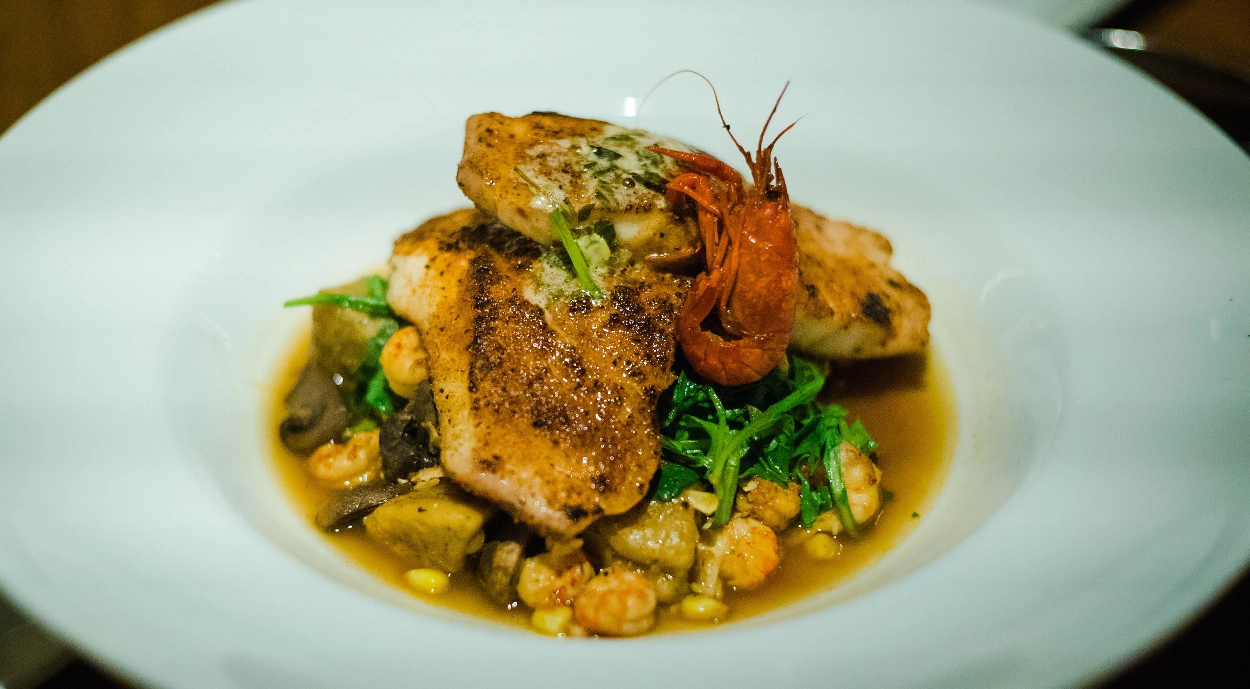 Geaux Fish A La Plancha, with butternut squash gnocchi (and of course, the crawfish garnish - those little guys get into everything!)