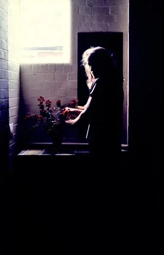 Wallflower Triptych 1979, 16mm film, 35mm slide, table, mirror, vase of wallflowers