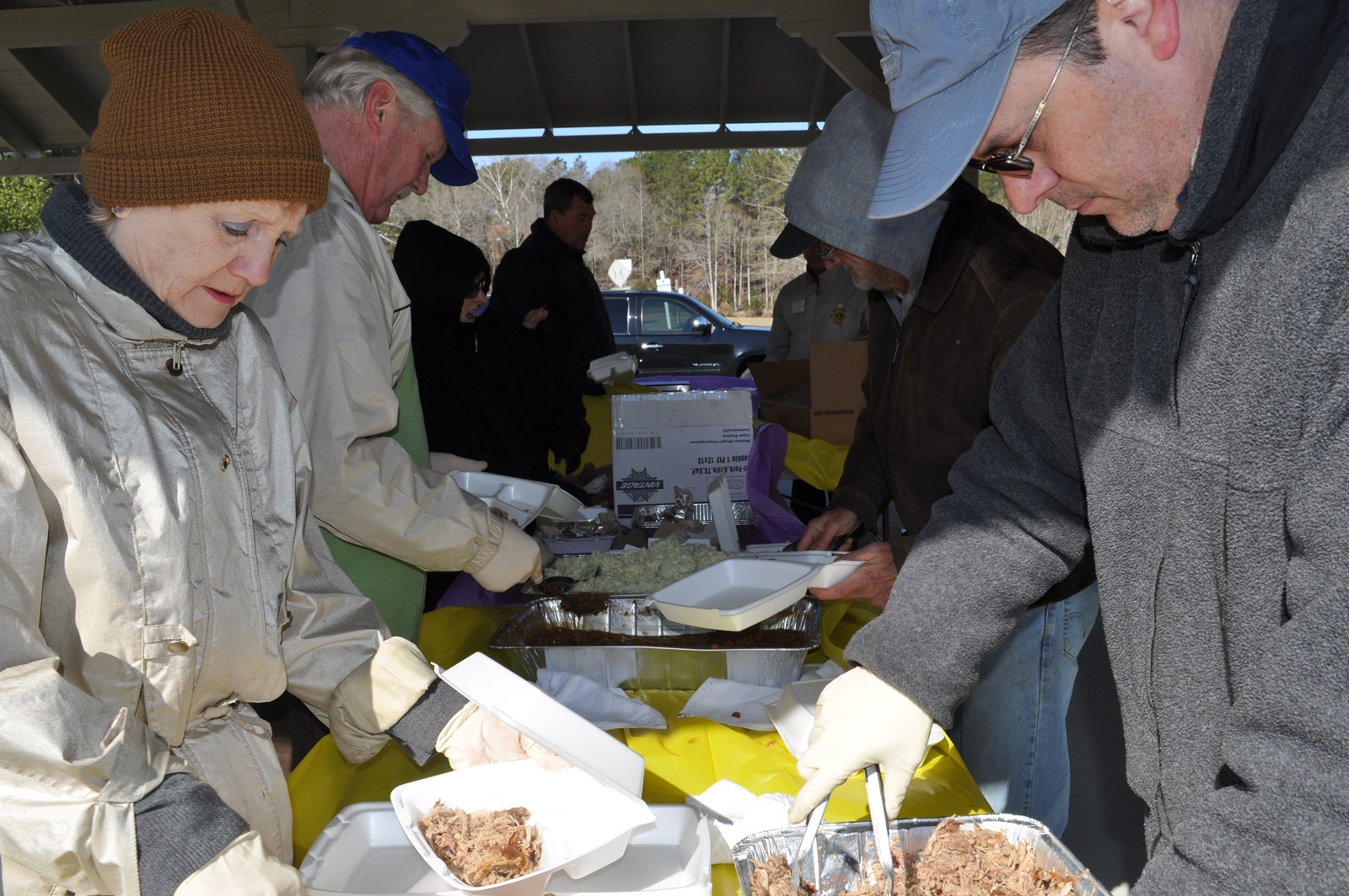  The serving line. Lions Connie, John, Cy, Fran andChris Dunn had a lot of orders to fill. 