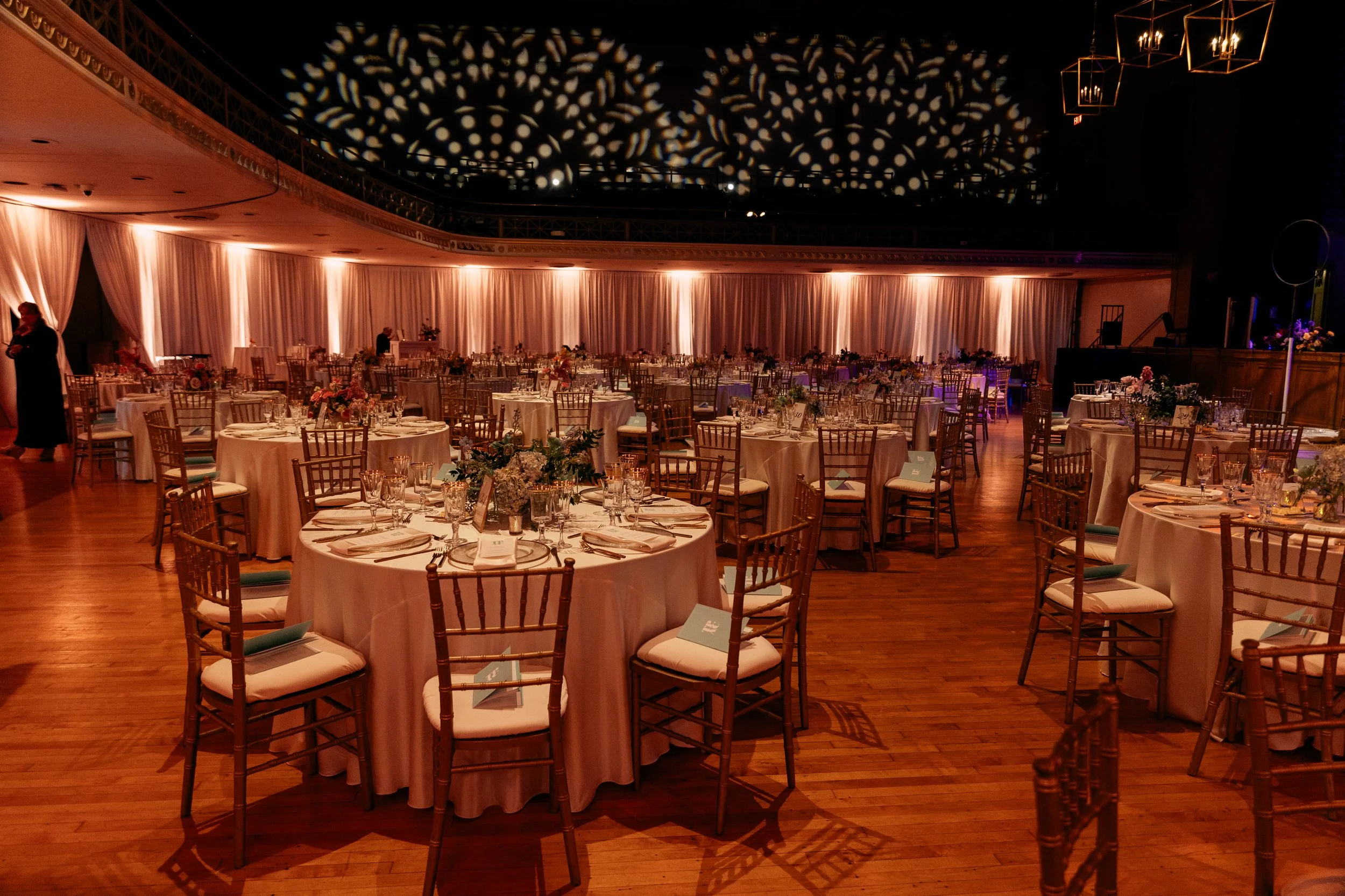 Modern and colorful centerpieces create a lively space for the TPAC Gala in Nashville, TN. Color-blocked floral hues of pink, red, yellow, blue comprised of roses, hydrangeas, tulips, ranunculus, pampas grass, carnations, and sweet peas. Designed by