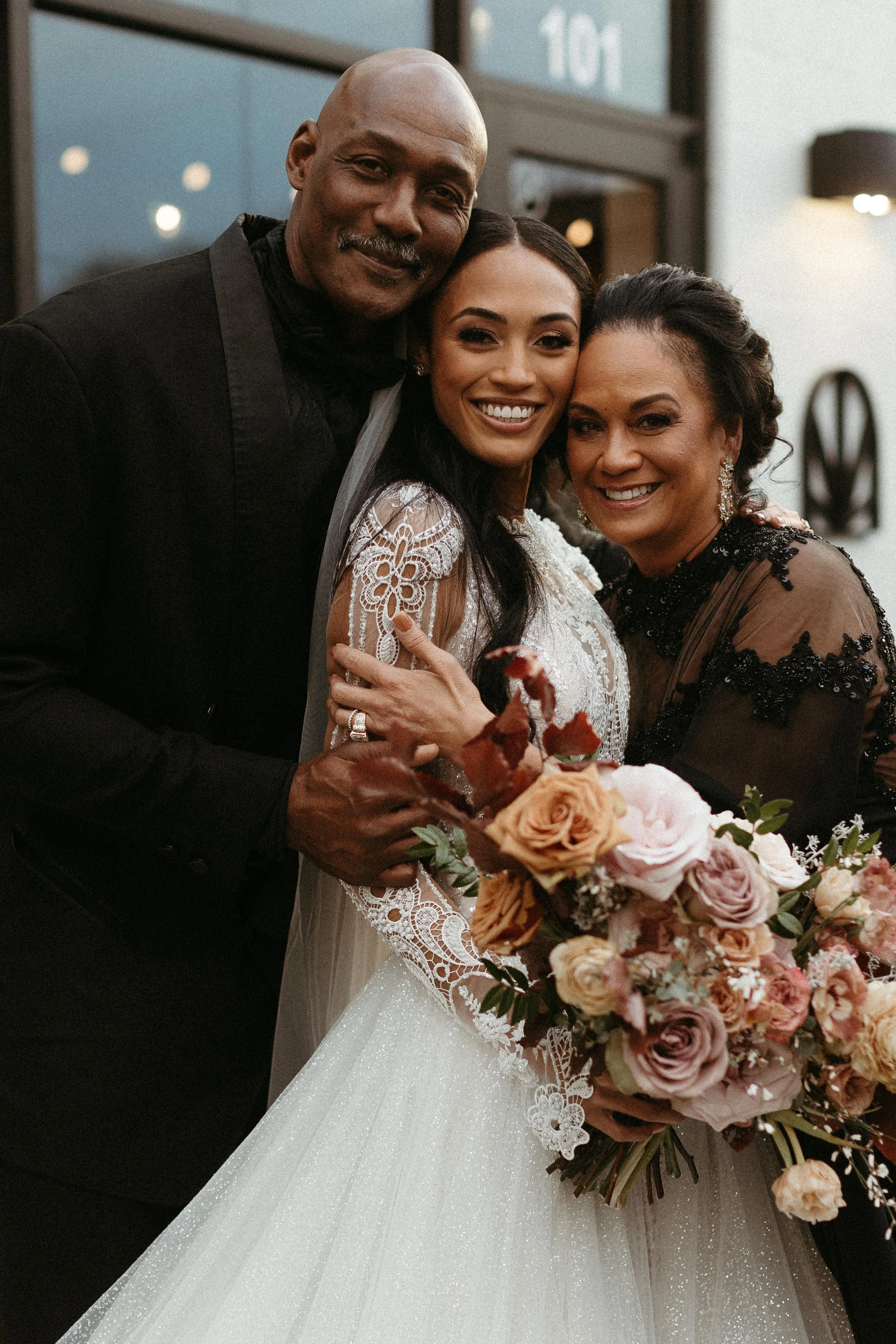 This elegant bridal bouquet brought hues of mauve, dusty pink, cream, burgundy, and terra cotta to this winter wedding. Lush with petal heavy roses, ranunculus, spray roses, copper beech, and greenery. Designed by Rosemary and Finch in Nashville, TN.