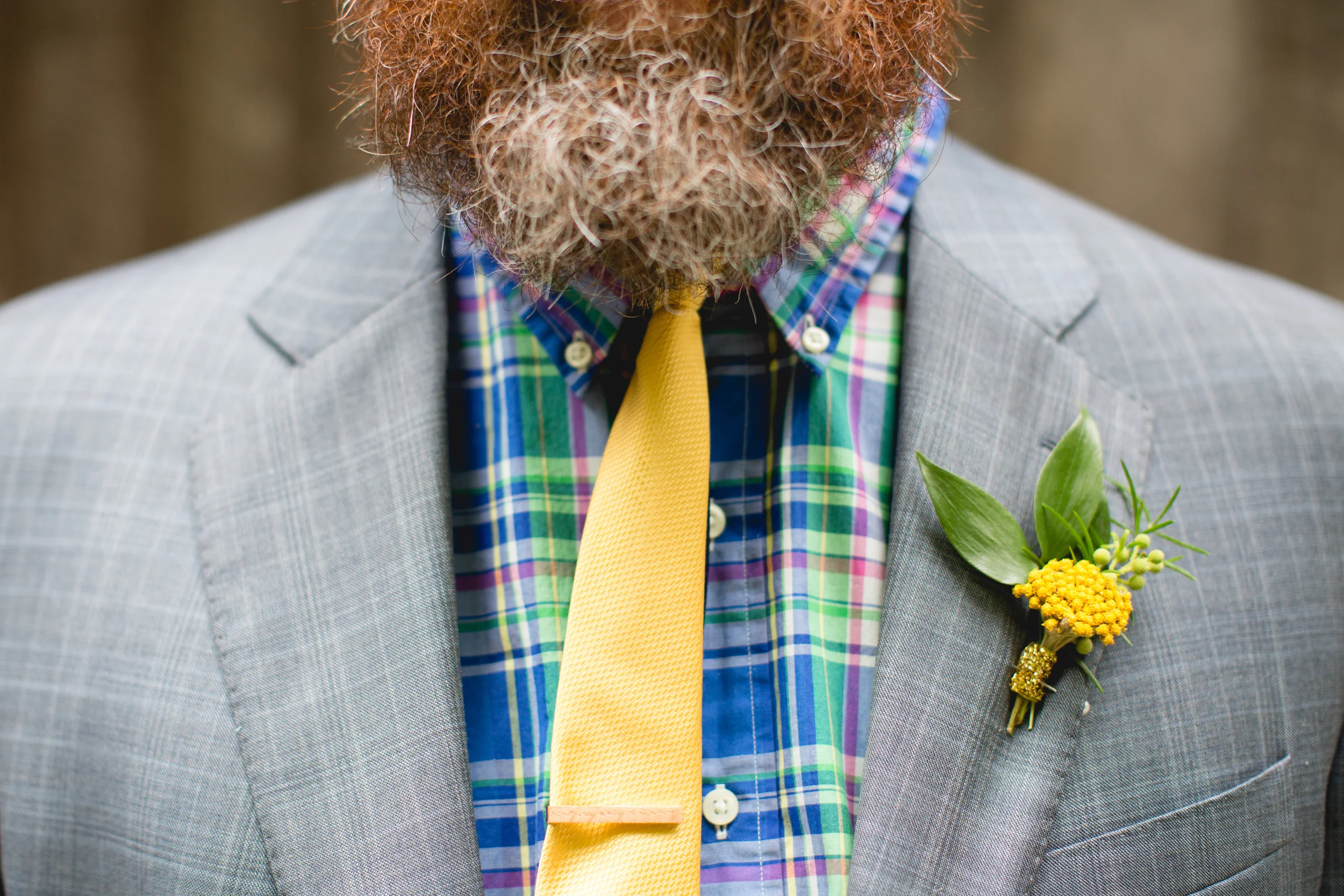 Bright yellow boutonniere