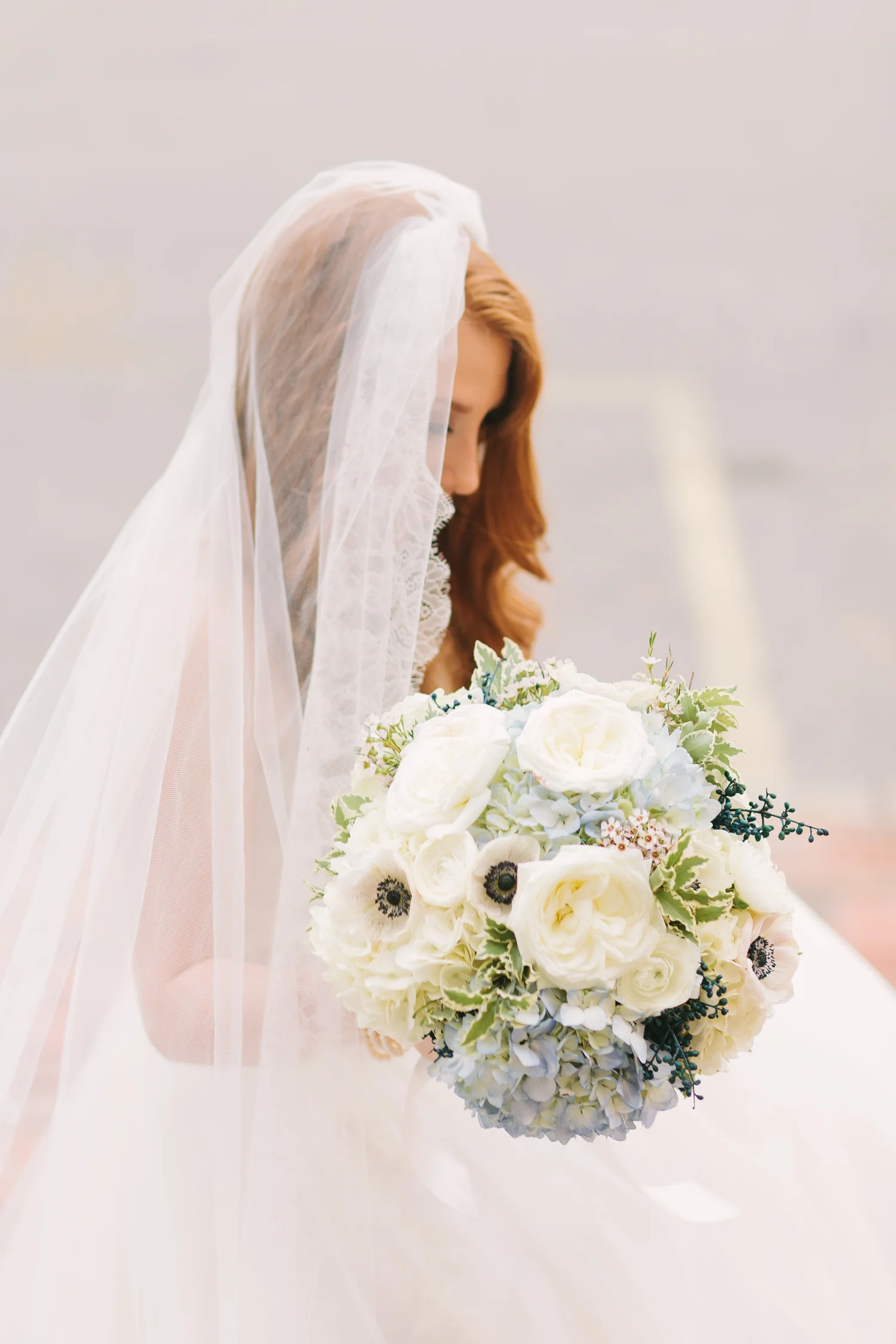 Hydrangea, garden rose, and anemone bridal bouquet