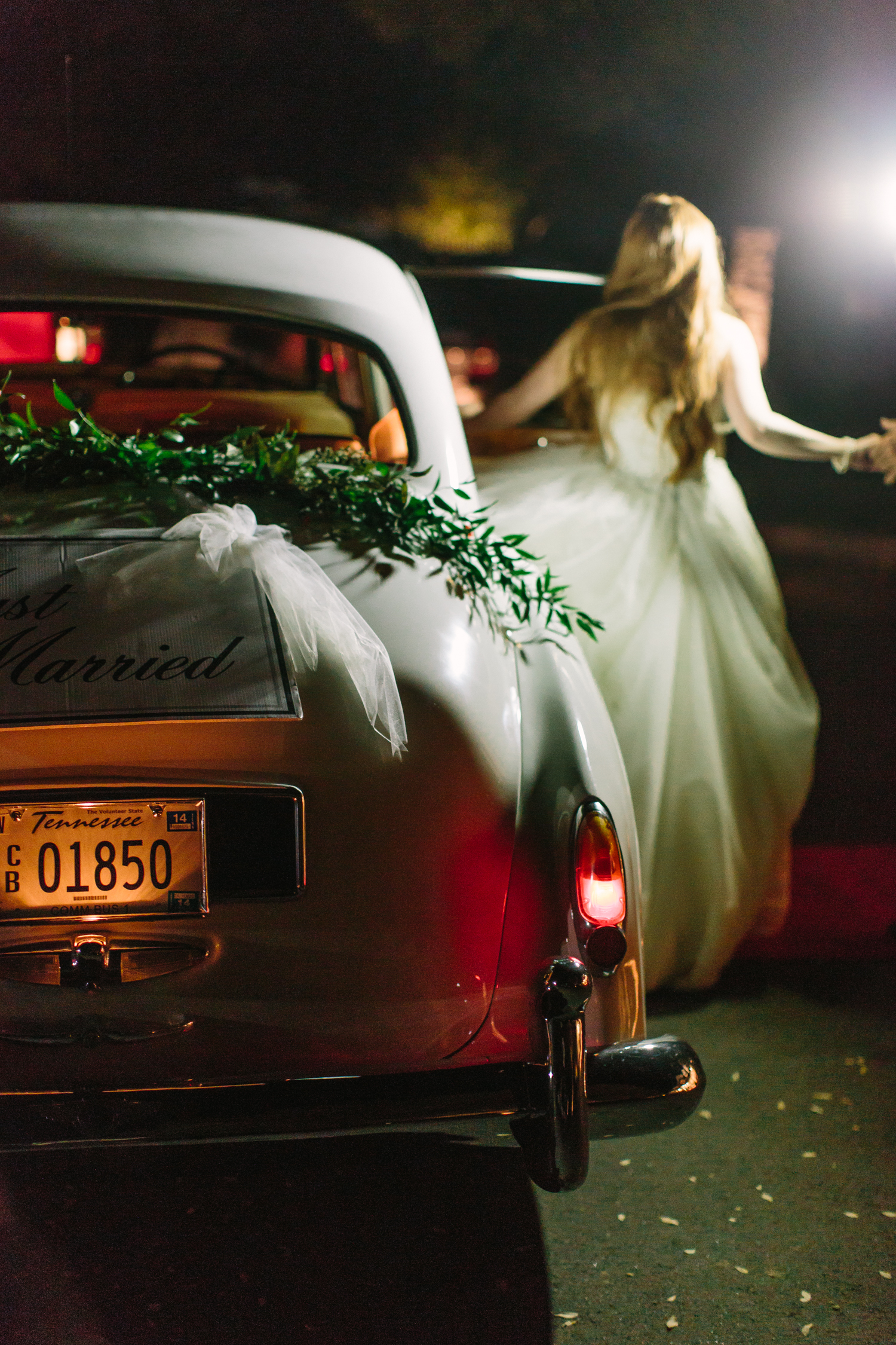 Fairytale Wedding Moment // Getaway car with garland // Franklin, TN Wedding Flowers