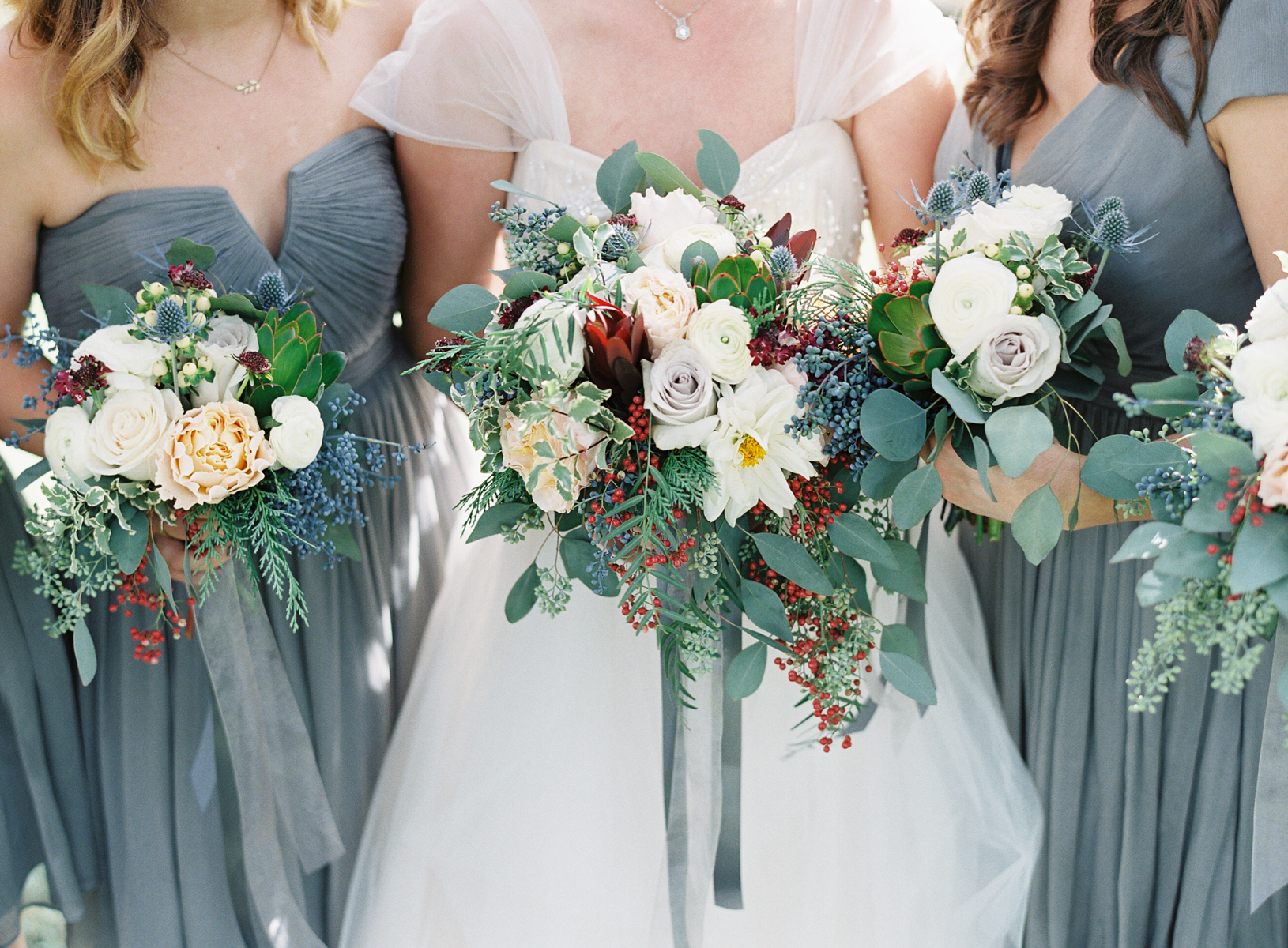Bouquets with berries, protea, roses, and dahlias // Nashville Wedding Florist