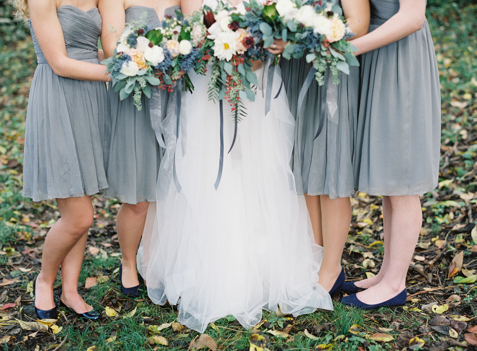 Grey bridesmaids dresses, bouquets with pops of peach, burgundy, and navy // Nashville Wedding Florist