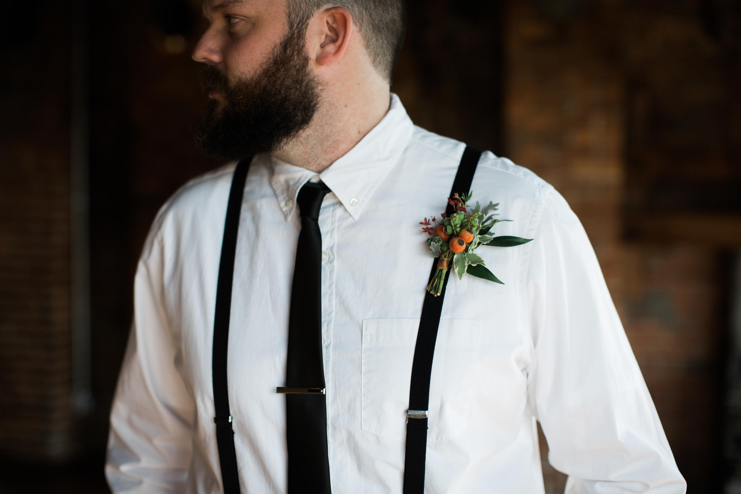 Boutonniere with berries and rosehips // Nashville Wedding Flowers