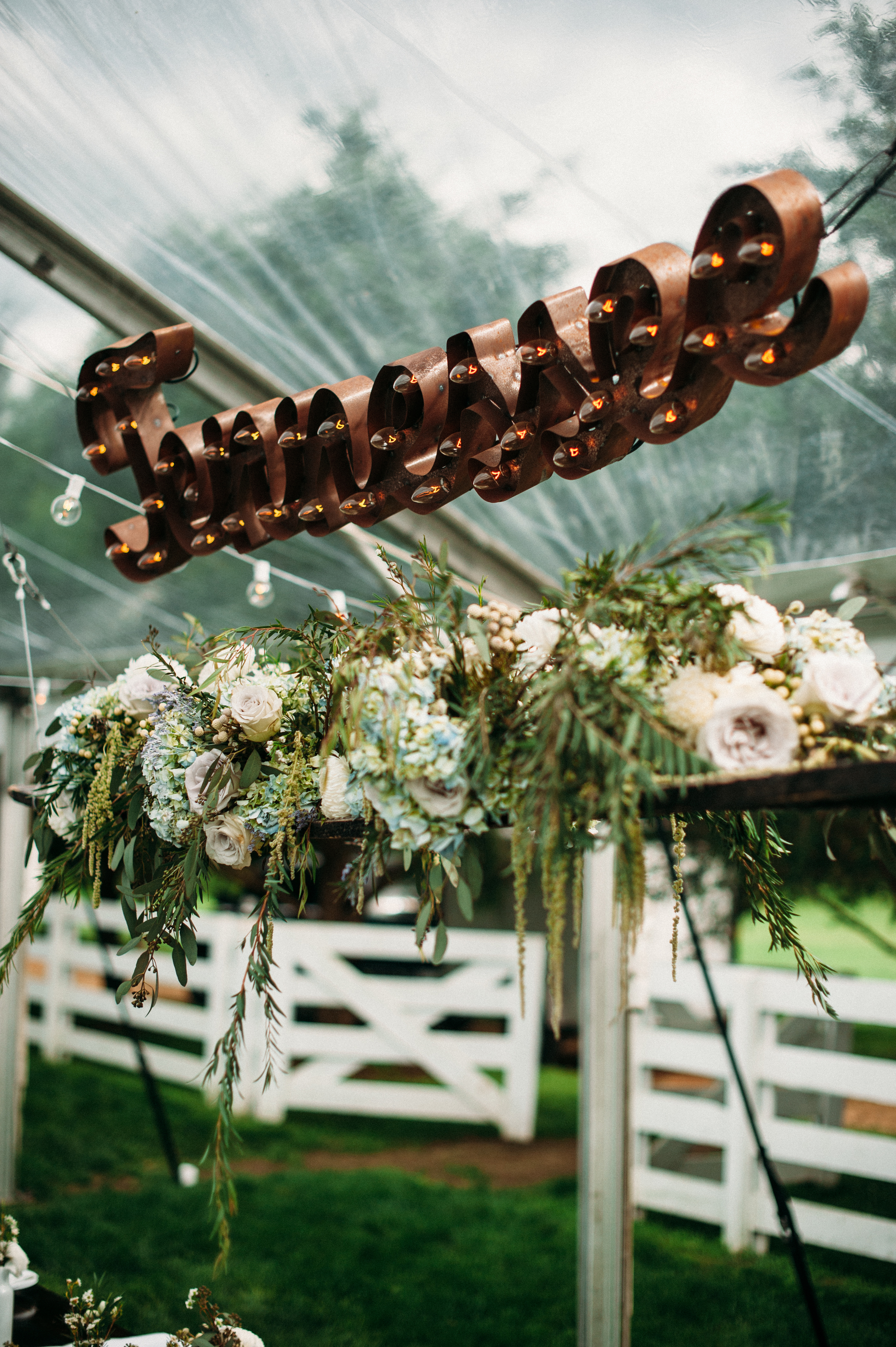 Hanging flower installation with marquee sign // Nashville Wedding Florist