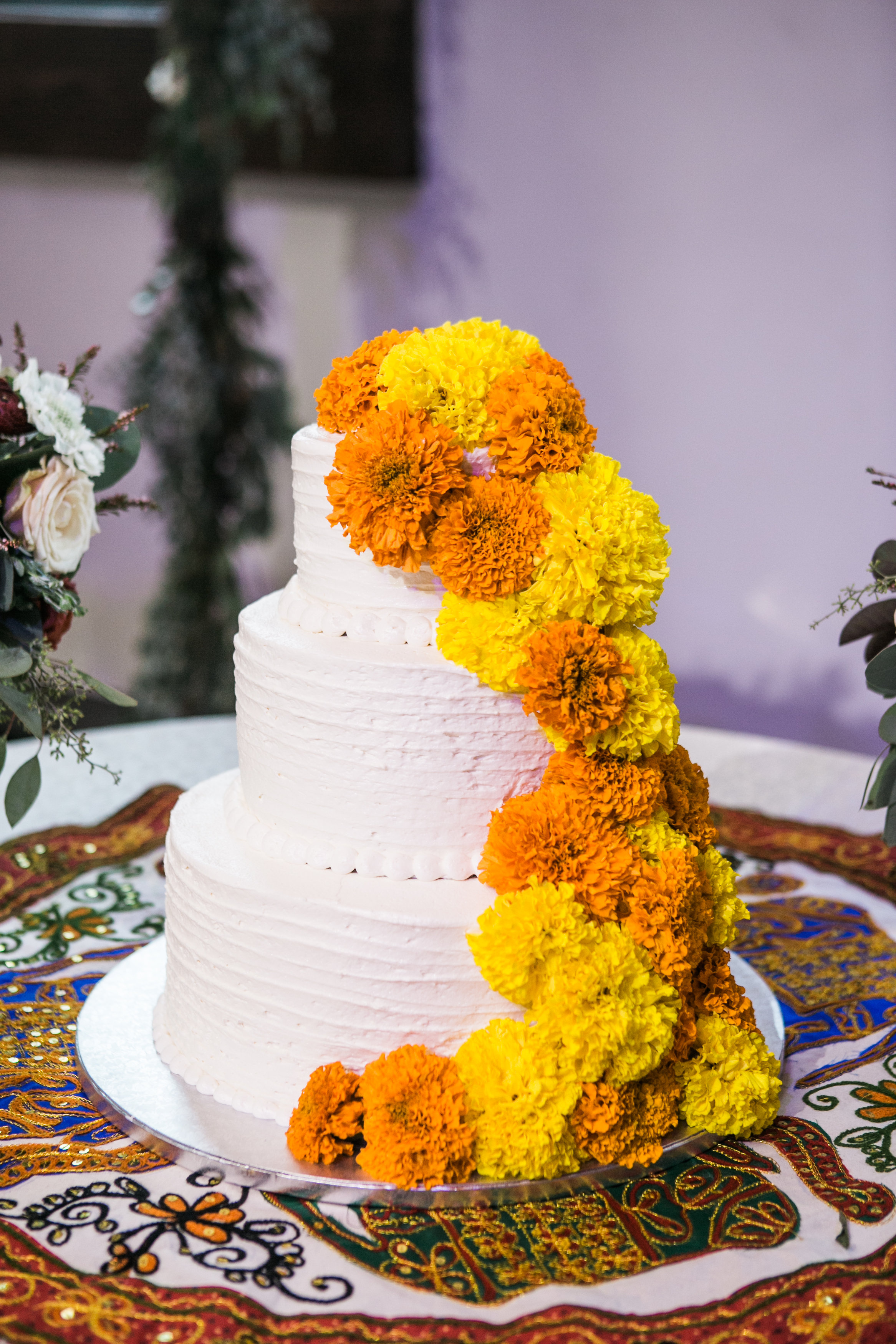 Cake with yellow marigolds // Nashville Wedding Florist