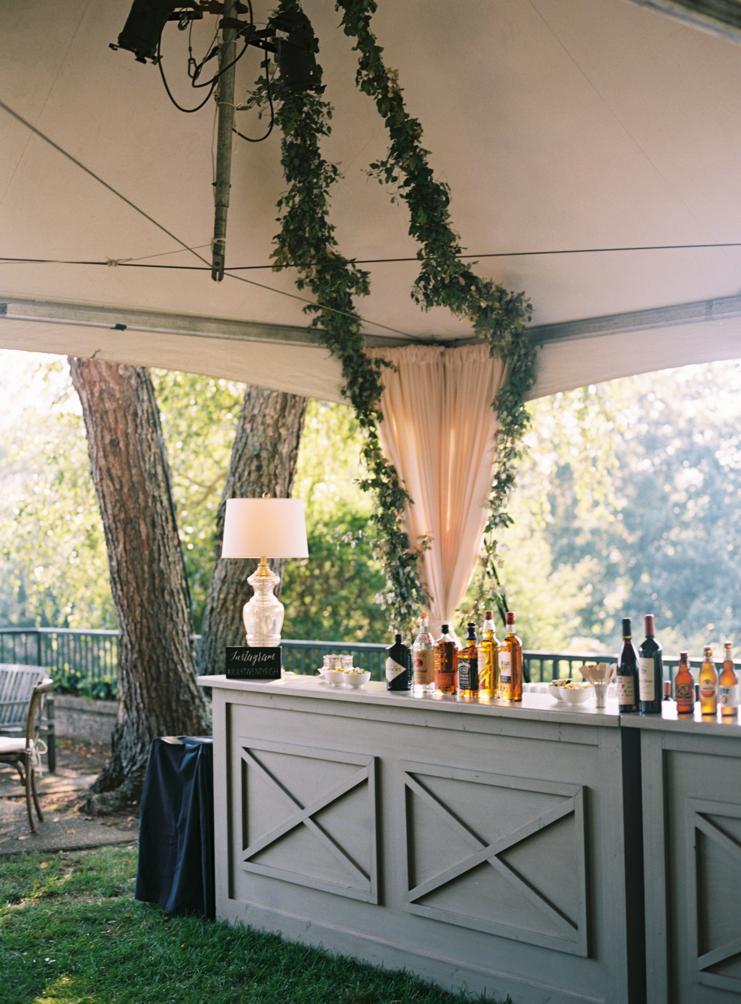 Tent with Garlands of Greenery // Belle Meade Wedding Floral Design