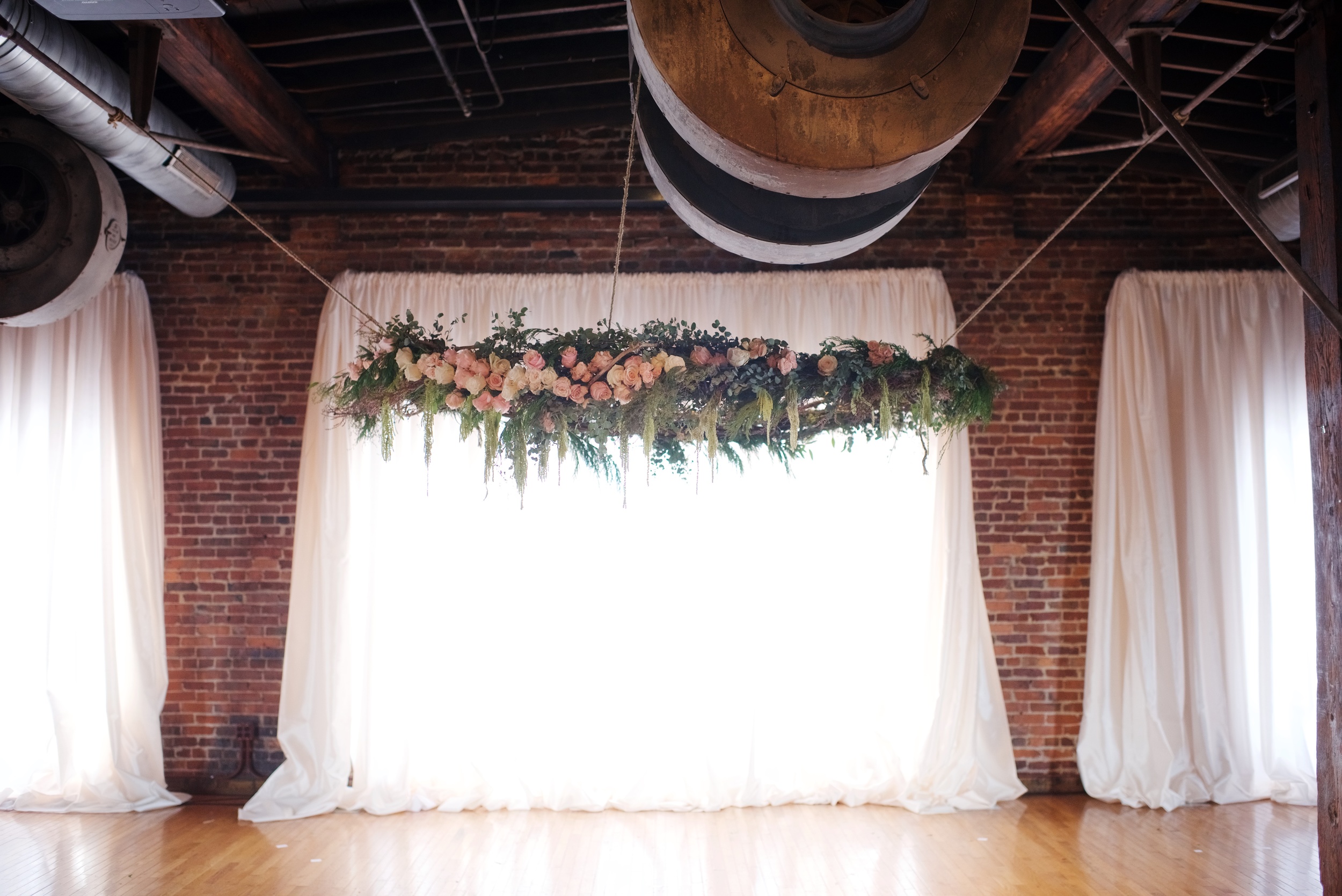 Hanging installation for wedding ceremony backdrop at Cannery One // Nashville Florist