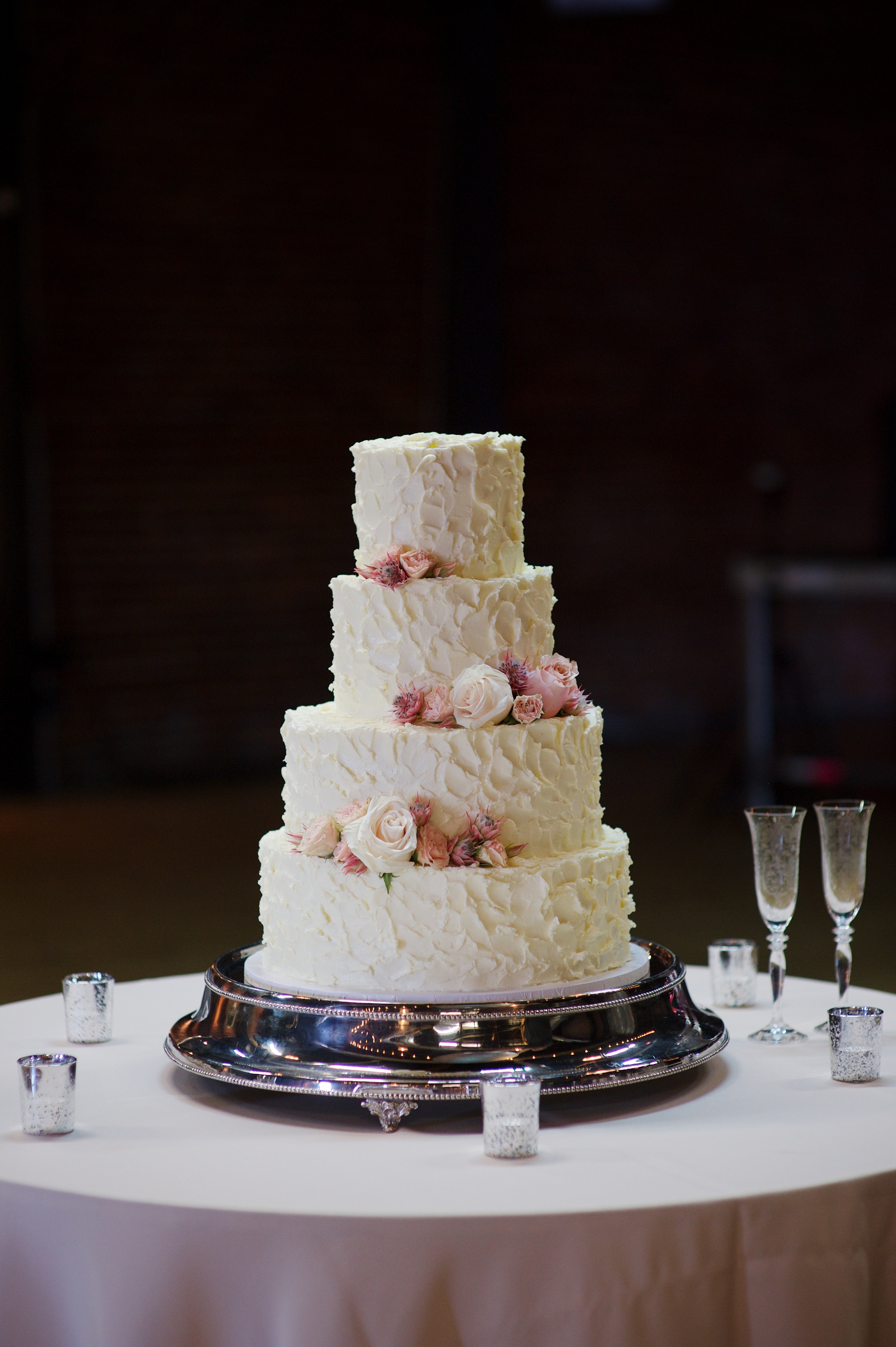 Wedding cake with blush and neutral floral accents // Nashville Wedding Florist