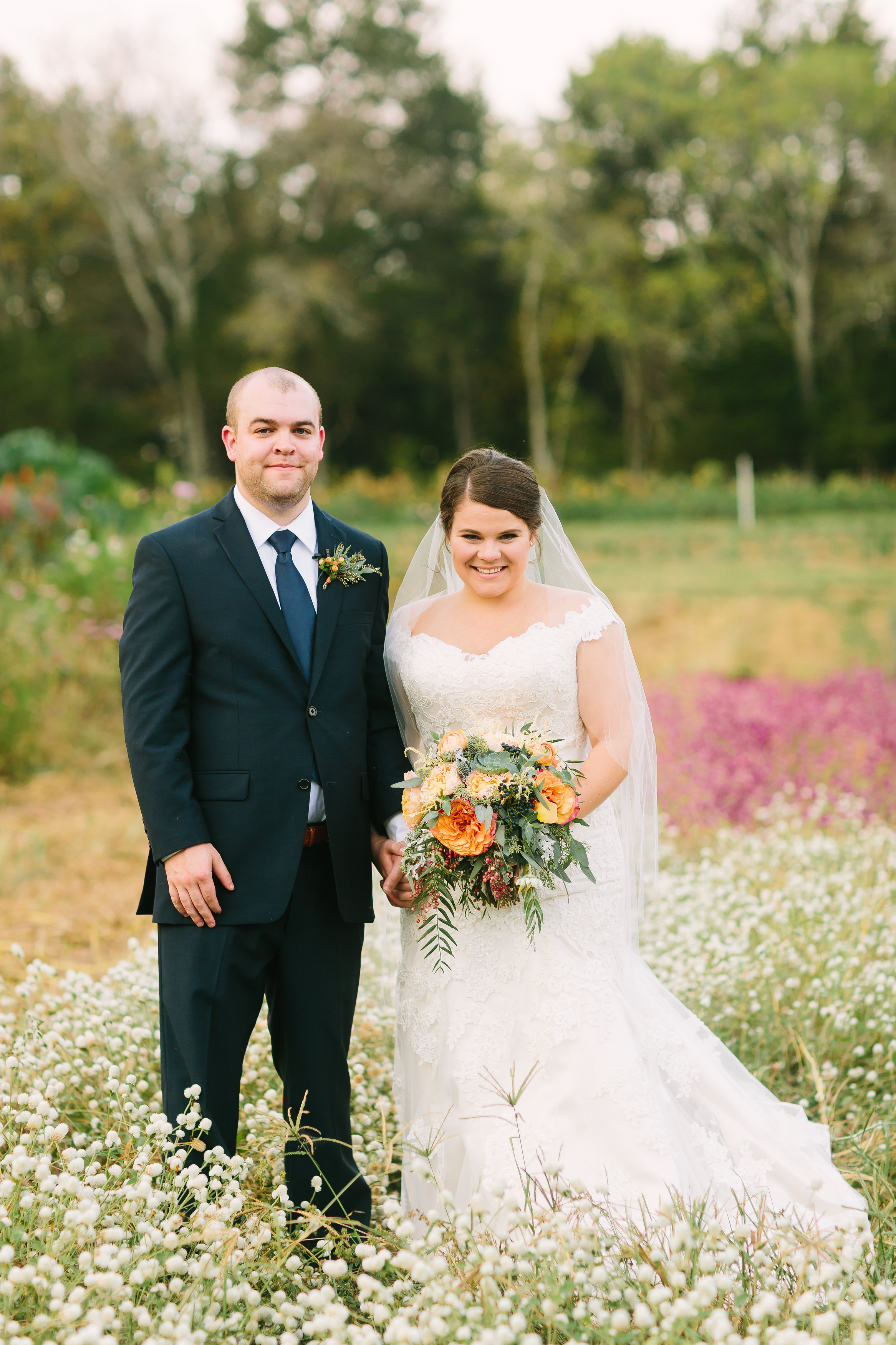 Bride and Groom portrait in flower garden // Nashville Floral Design