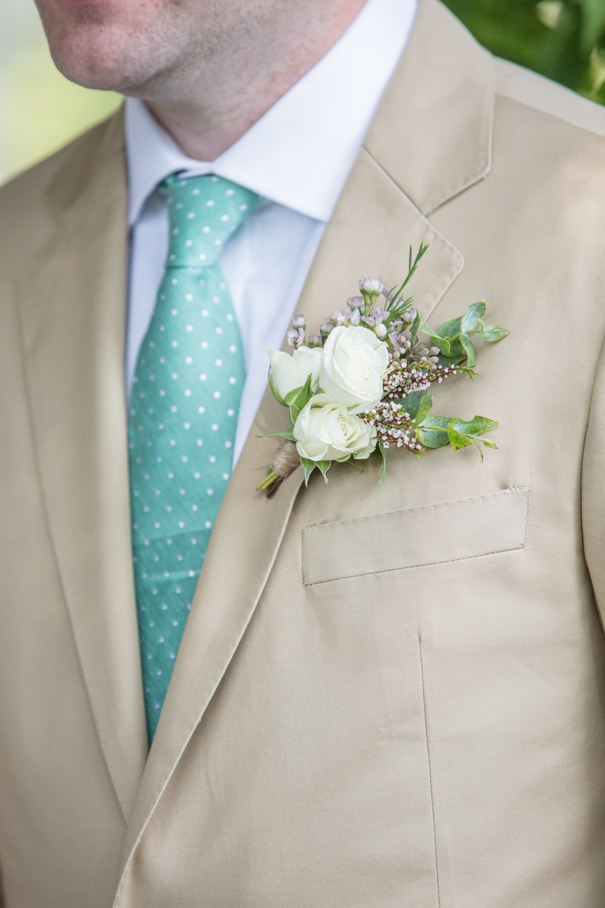 Cream and greenery boutonniere // Nashville Florist