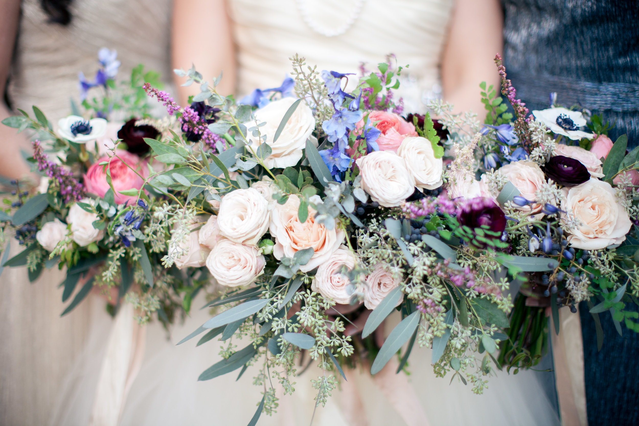 Lush Bouquets with pops of burgundy, rose pink, and blue