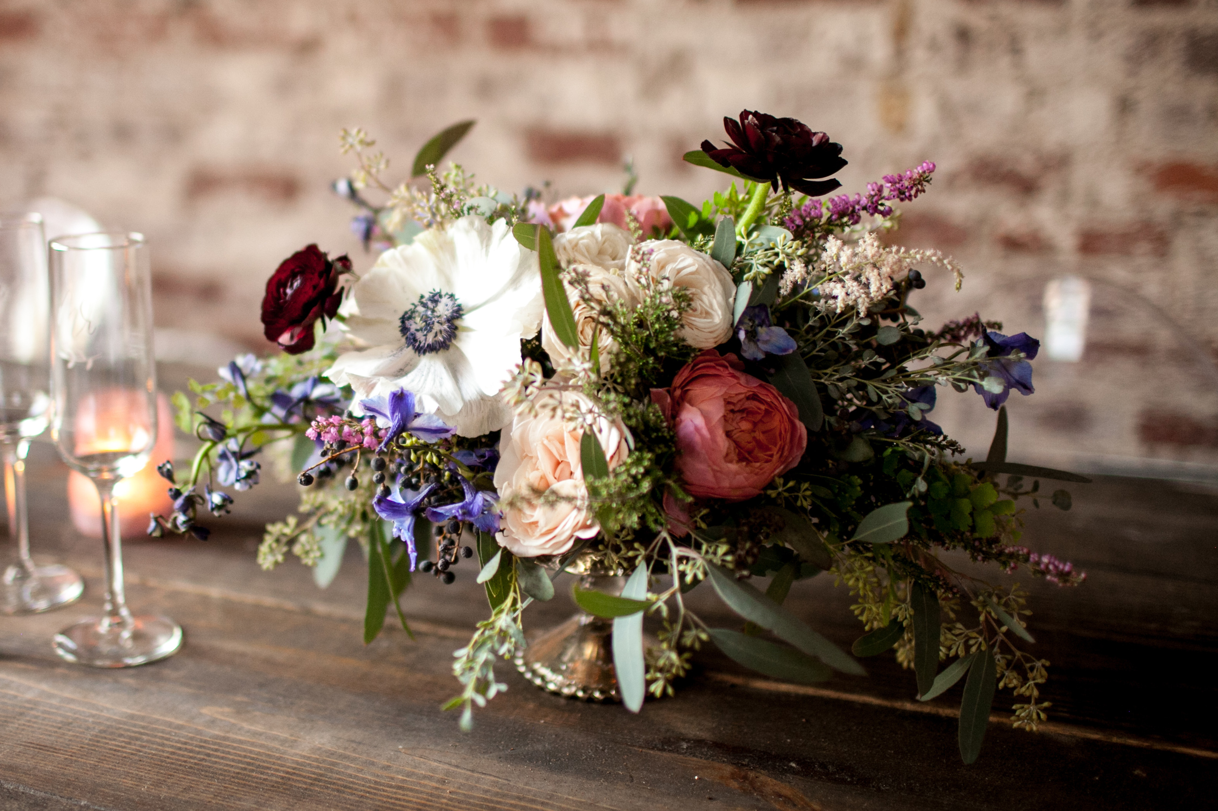 Lush floral centerpiece with anemones and ranunculus // Southeast Florist
