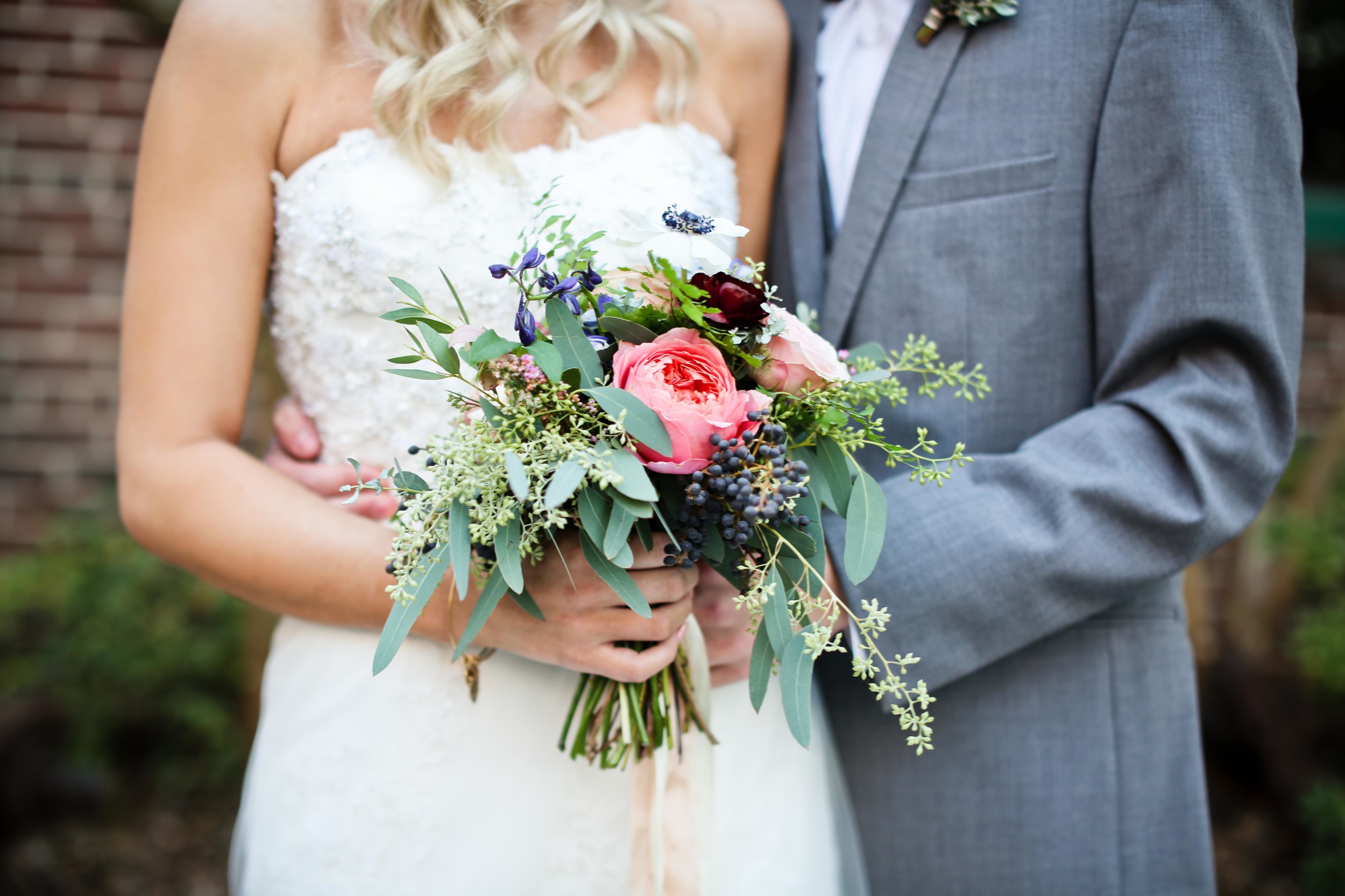 Lush bridal bouquet with rosy pink garden roses, anemones, and navy berries // Nashville and the Southeast Florist