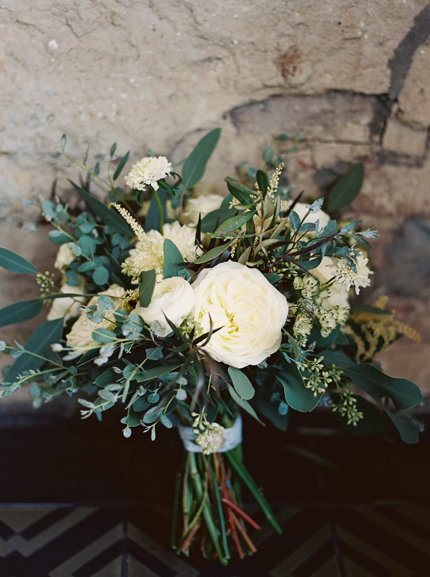 Loose, organic bouquet with lots of greenery and all white flowers // Nashville Wedding Florist