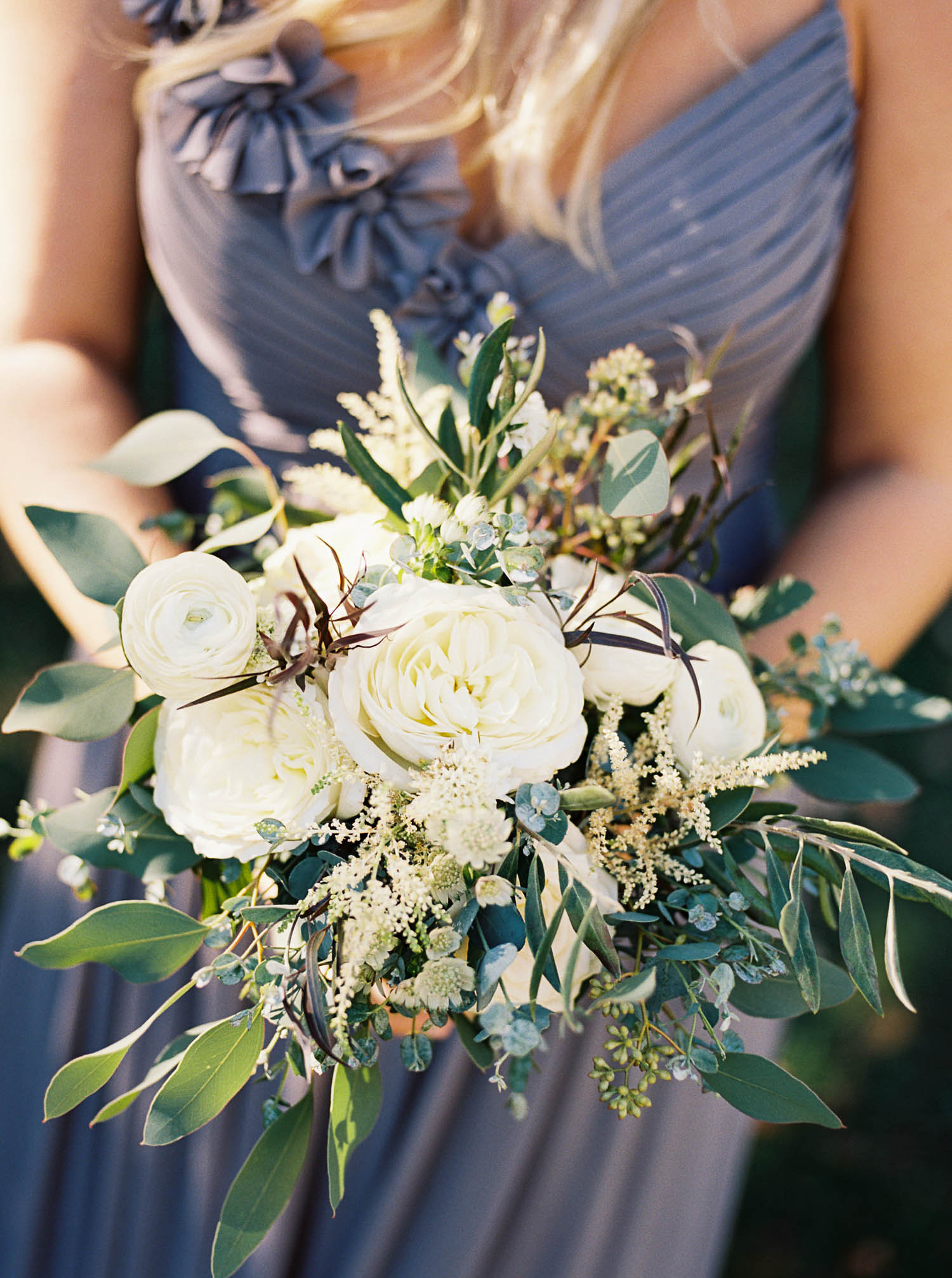 All white and greenery bridesmaid bouquet // Lush floral design