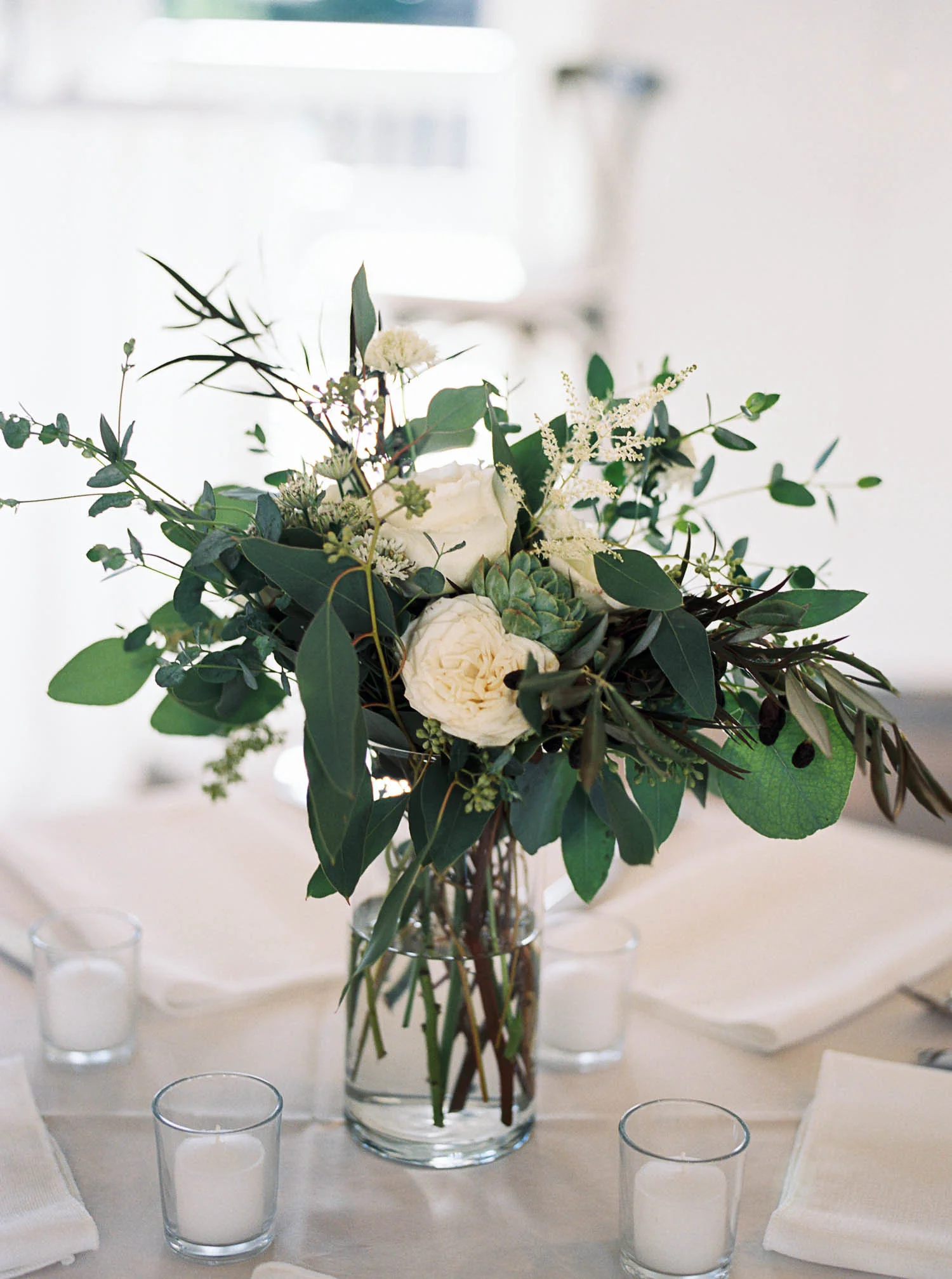 Lush, greenery heavy centerpiece // Destination Wedding Floral Design