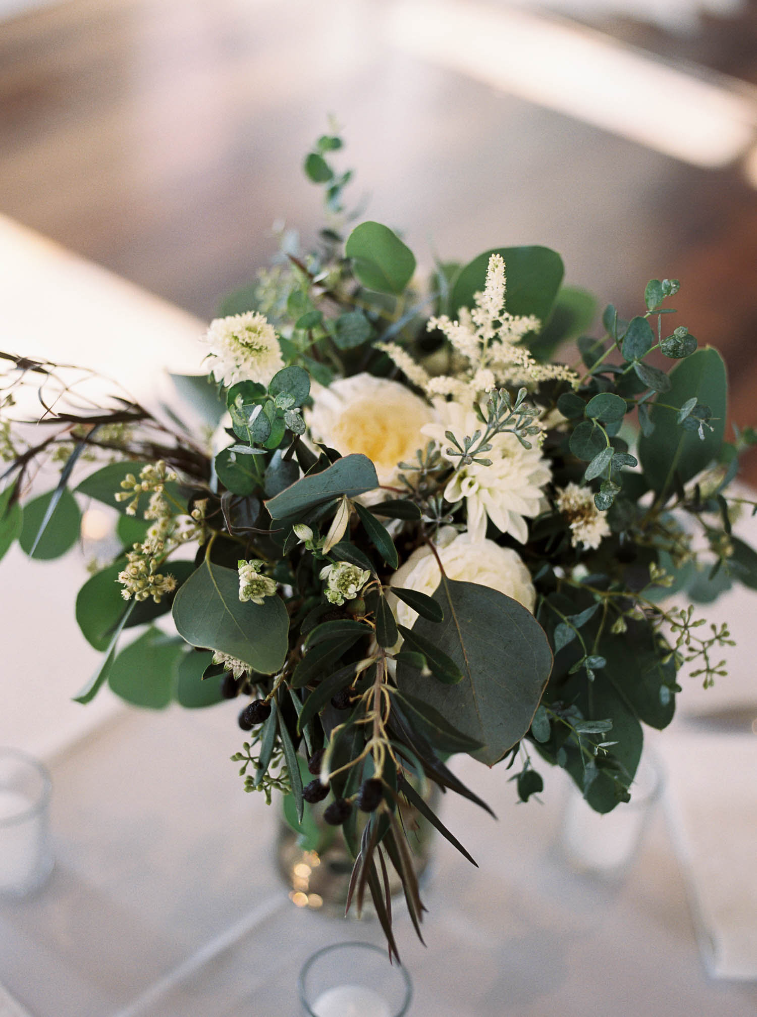 Lush, greenery heavy centerpiece // Destination Wedding Floral Design