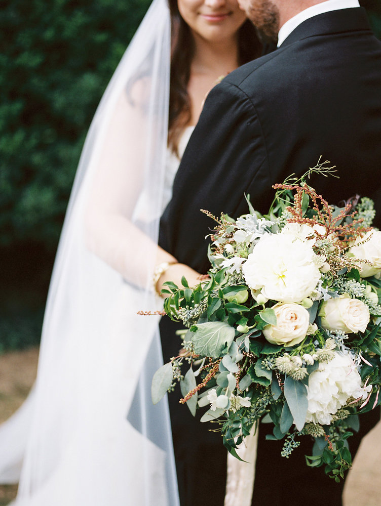 Intimate moment between the bride and groom / Botanic Garden Wedding Floral Design