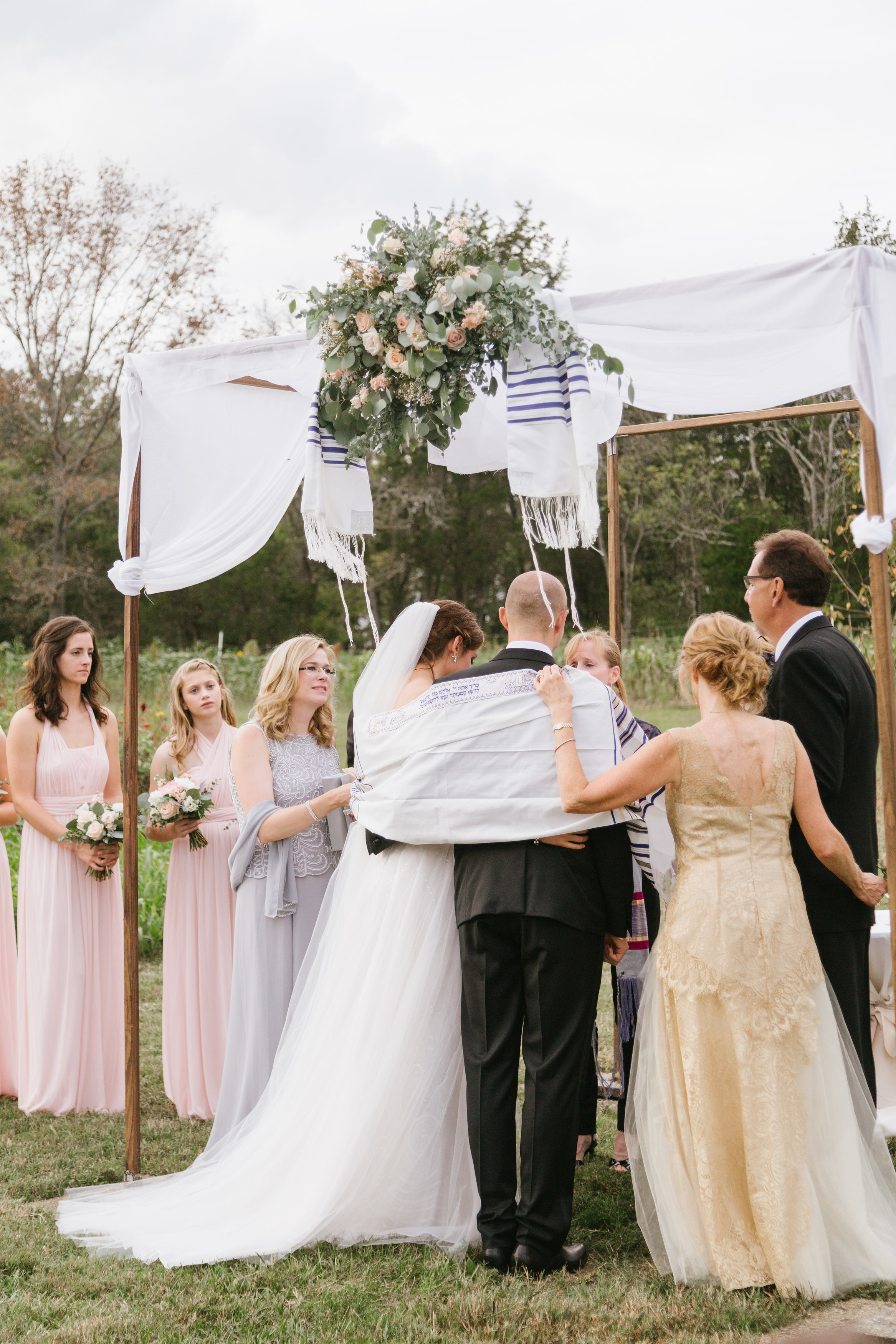 Wedding blessing under the chuppah // Nashville Wedding Florist