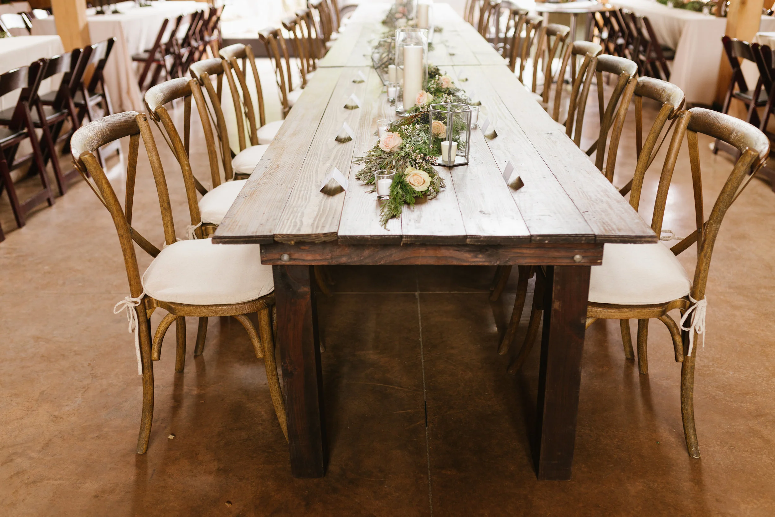 Lush garland runner with floral accents // Green Door Gourmet Wedding