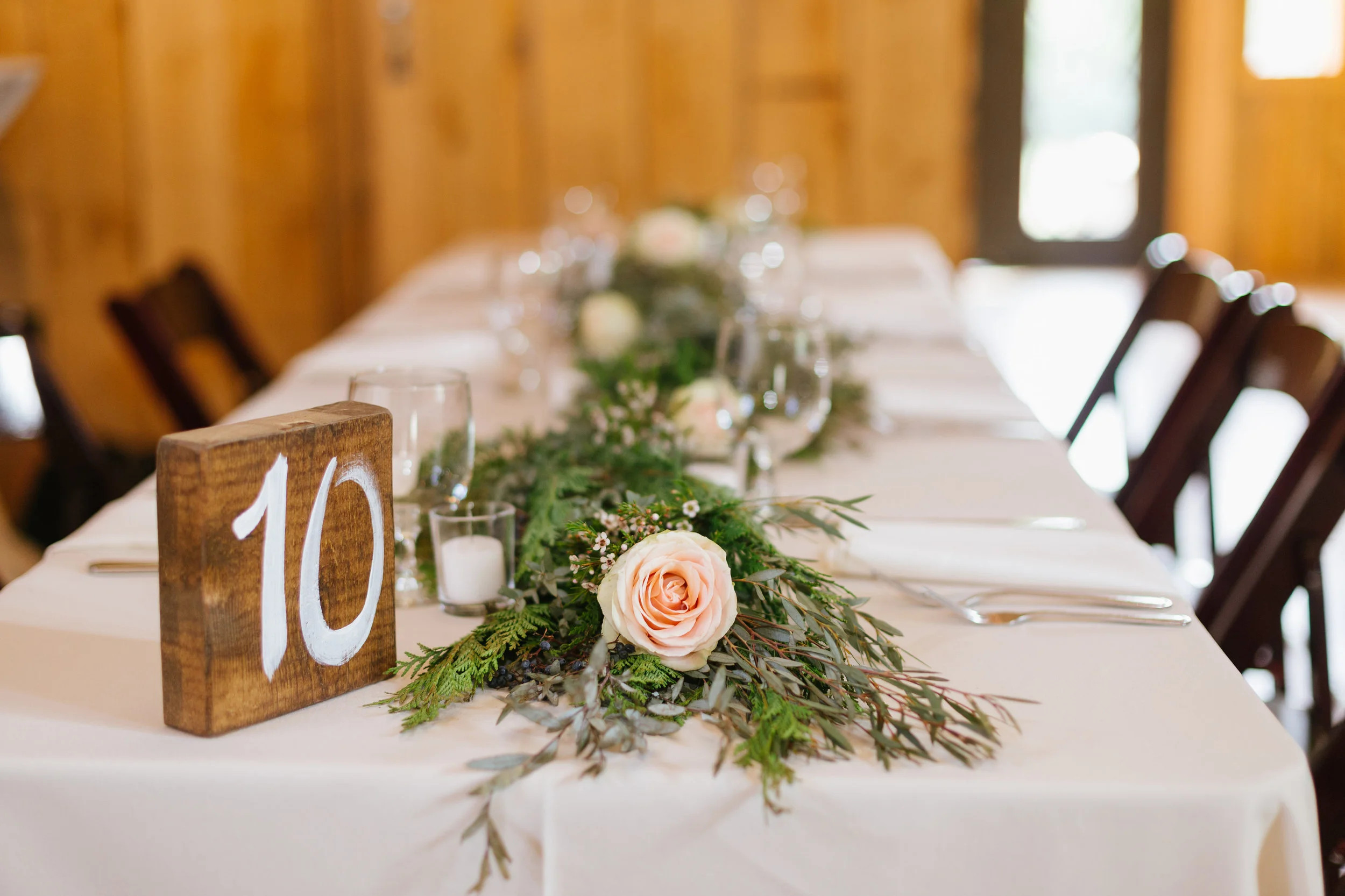 Greenery garland with blush roses