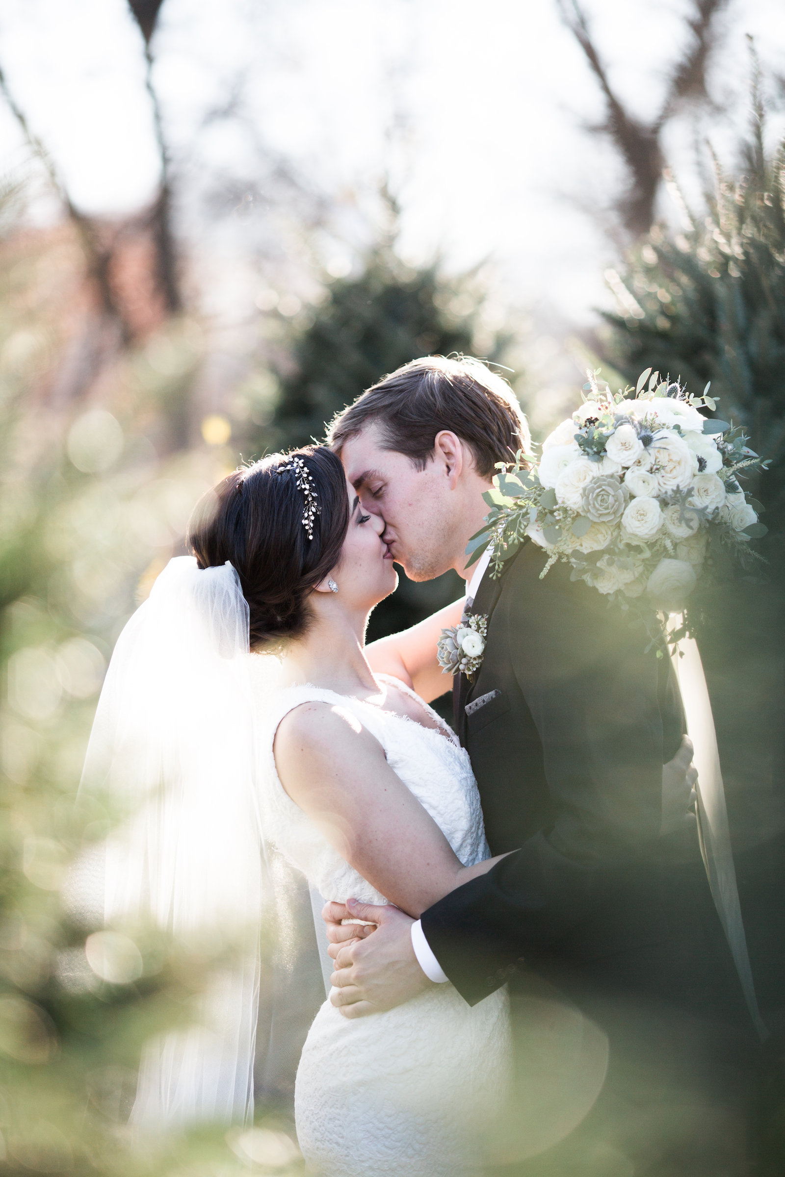 Newlywed portraits at a Christmas tree lot // Nashville Floral Design