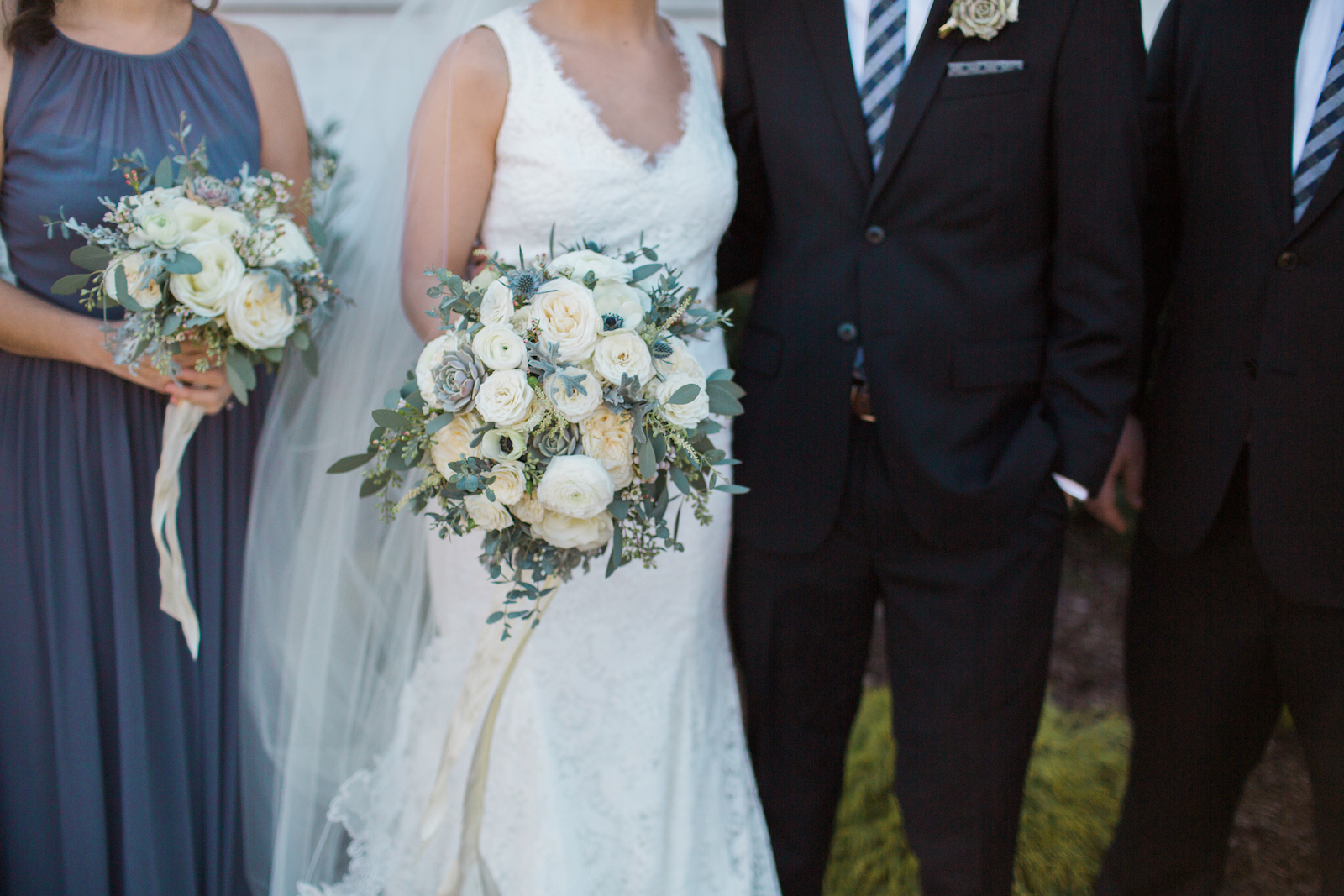 Lush winter wedding bouquet with white florals and anemones // Nashville Florist
