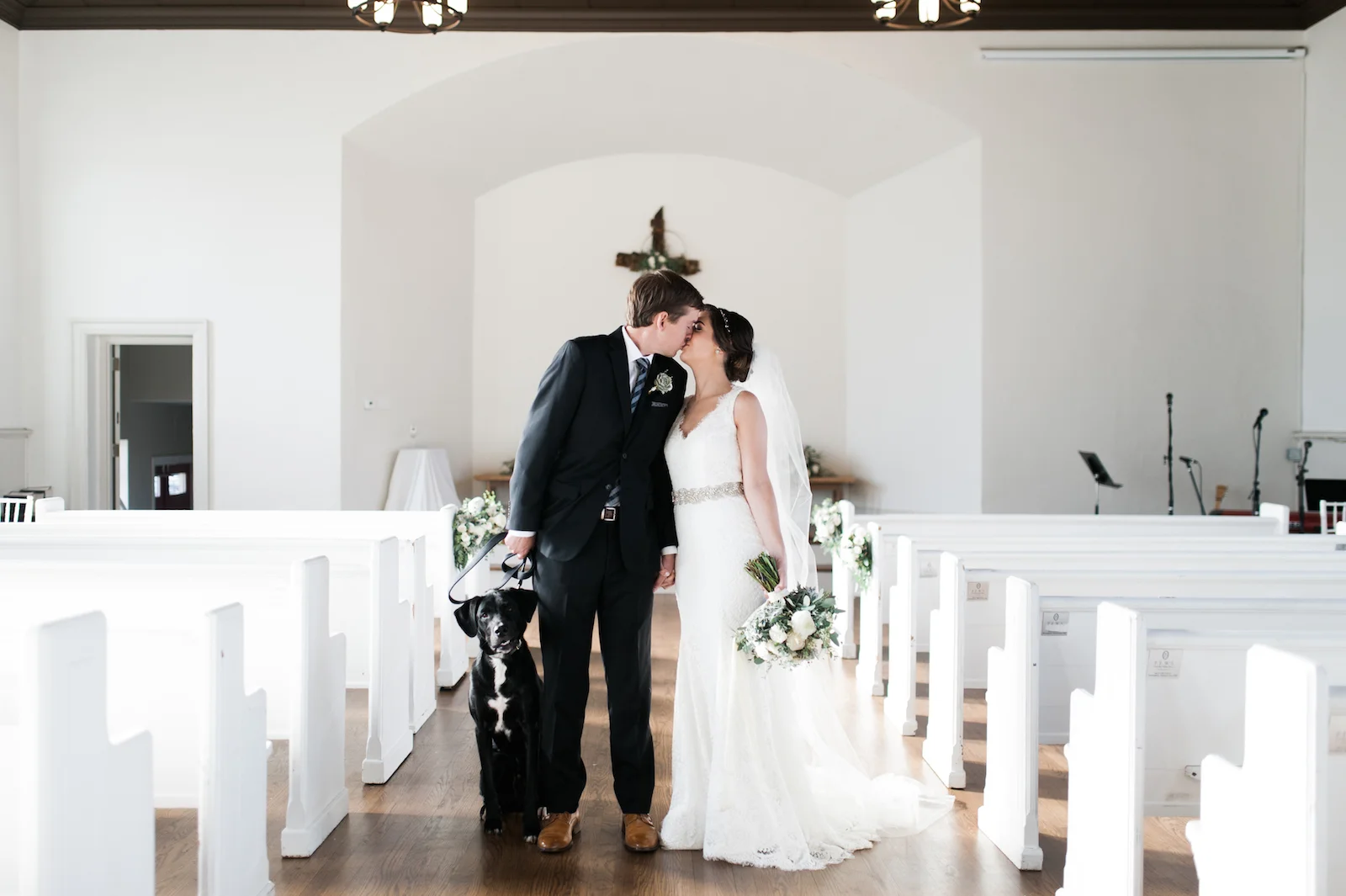 Bride and groom with dog // Nashville Floral Design