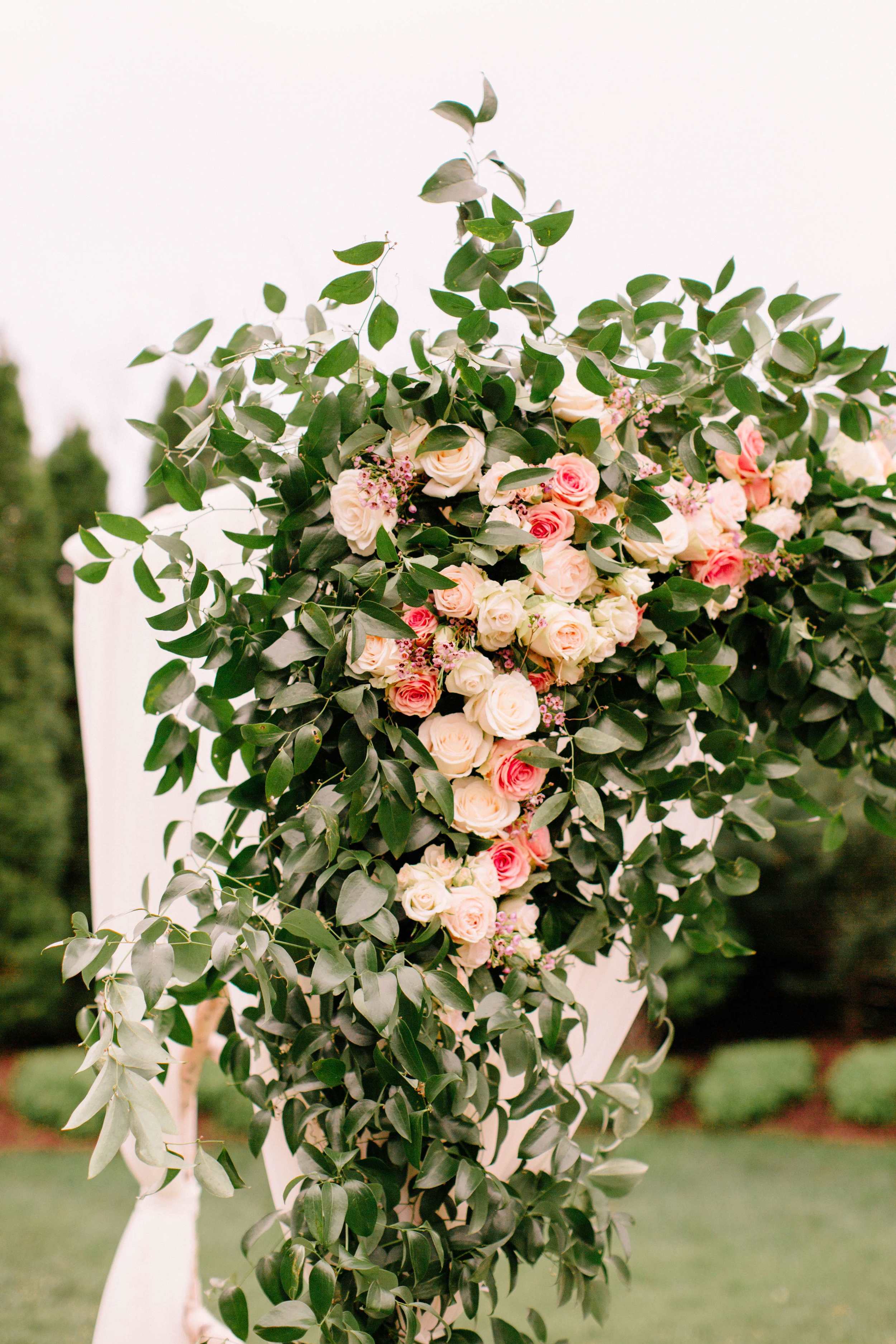 Rose details on a large chuppah // Wedding Ceremony Flowers